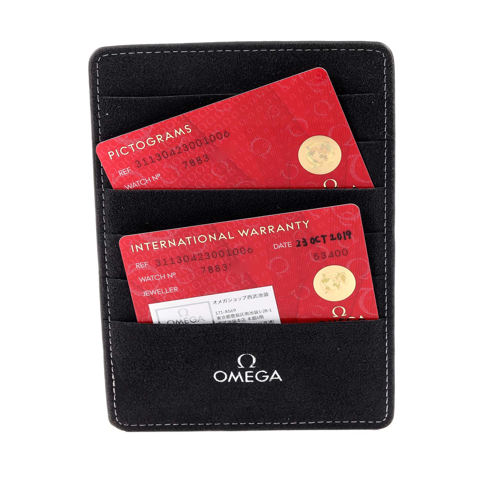 The image shows a card holder with pictograms and an international warranty card for an Omega Speedmaster 311.30.42.30.01.006 Men
s Stainless Steel Black Dial 311.30.42.30.01.006 Men
s Stainless Steel Black Dial watch.