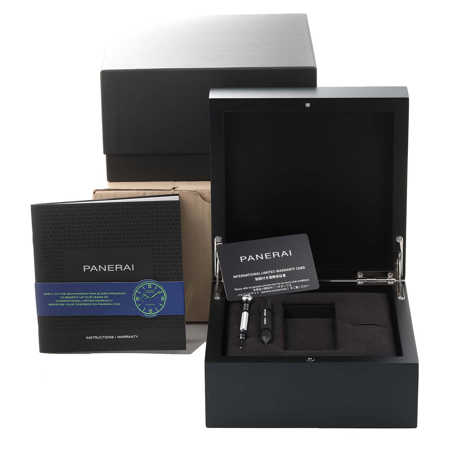 The image shows the packaging and accessories, including the warranty card and tools, for a Panerai Luminor PAM01056 Men
s Stainless Steel Green Dial PAM01056 Men
s Stainless Steel Green Dial model watch.