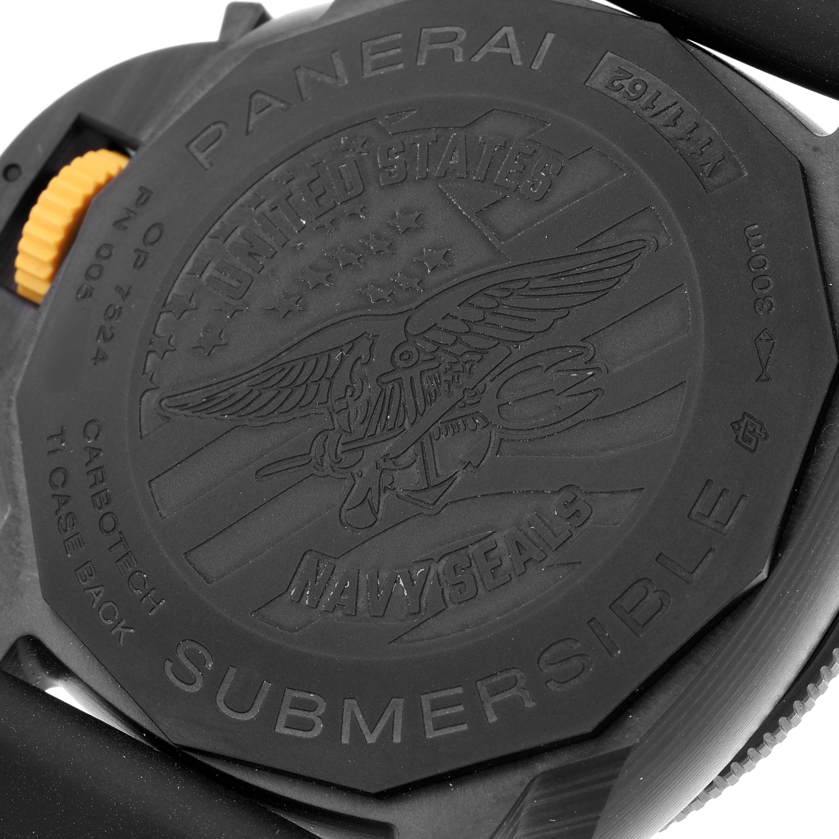 This image shows the back case of a Panerai Submersible PAM01324 Men's Ceramic Grey Dial PAM01324 Men's Ceramic Grey Dial watch, featuring "United States Navy Seals" engraving and CarboTech material.