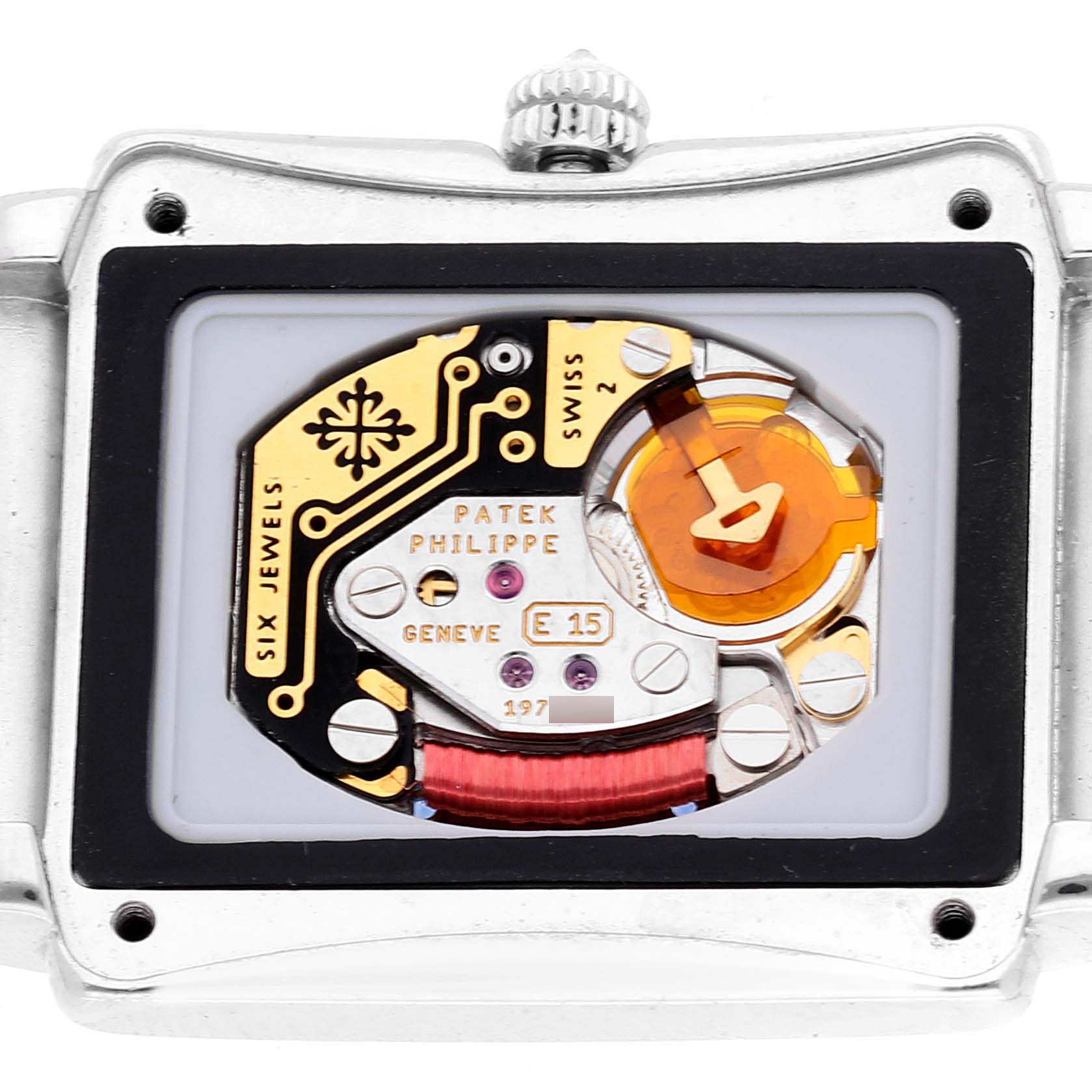 The image shows the backside of a Patek Philippe Gondolo 4825G Women's White Gold White Dial 4825G Women's White Gold White Dial watch, highlighting its intricate movement components.