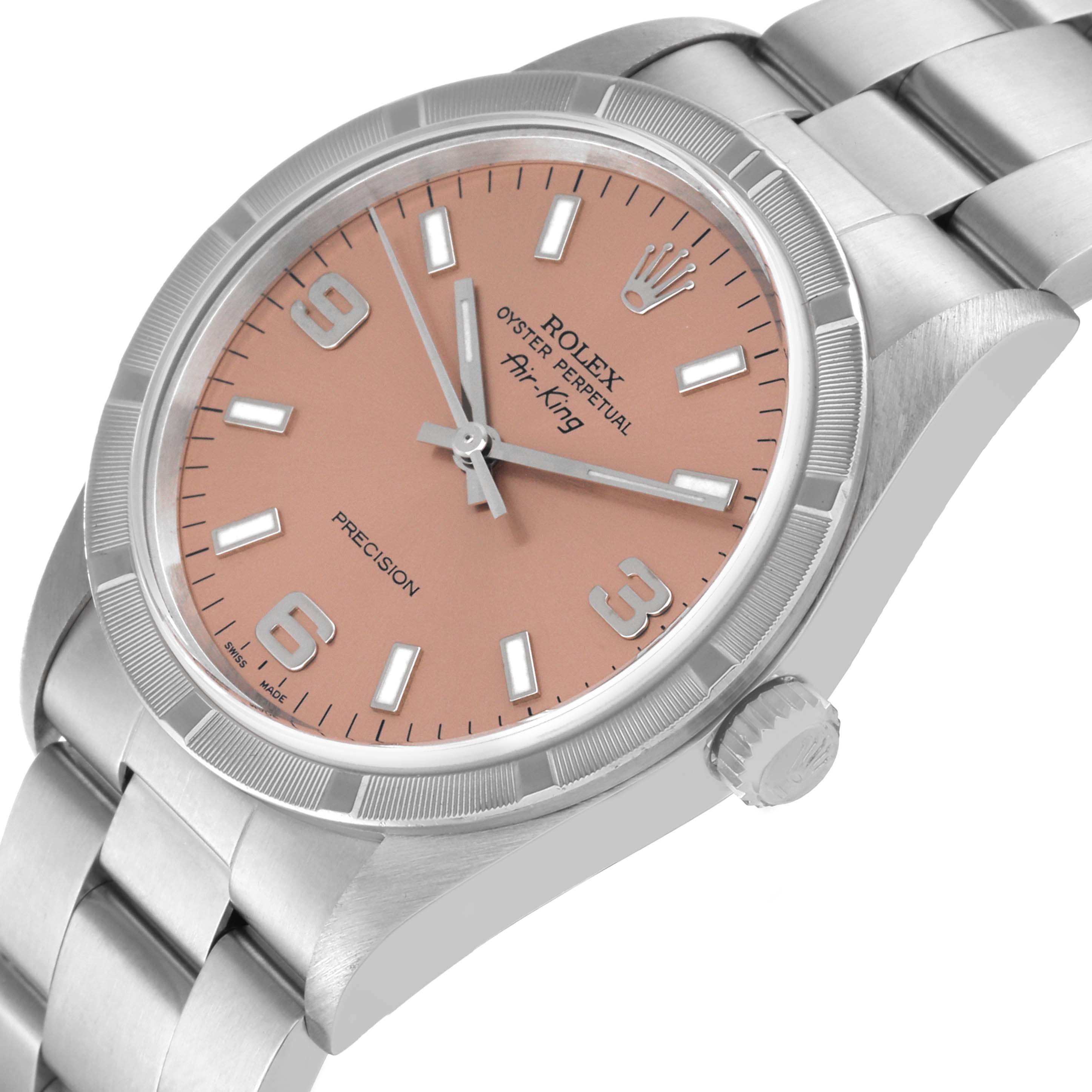 This image shows a Rolex Air-King 14010 Men's Stainless Steel Pink Dial 14010 Men's Stainless Steel Pink Dial watch at an angle featuring the case, dial, crown, and part of the bracelet.