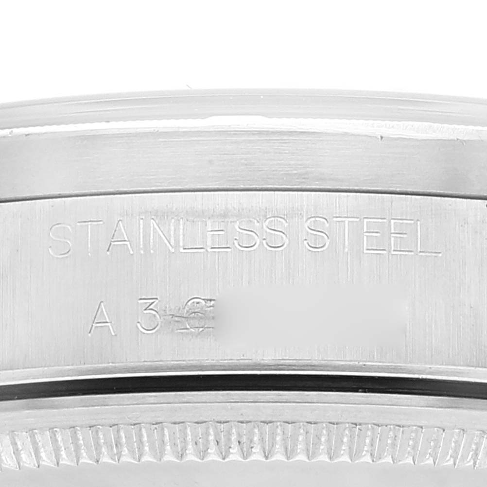 The image shows a close-up side view of the stainless steel back case of a Rolex Air-King 14010 Men's Stainless Steel Pink Dial 14010 Men's Stainless Steel Pink Dial watch.