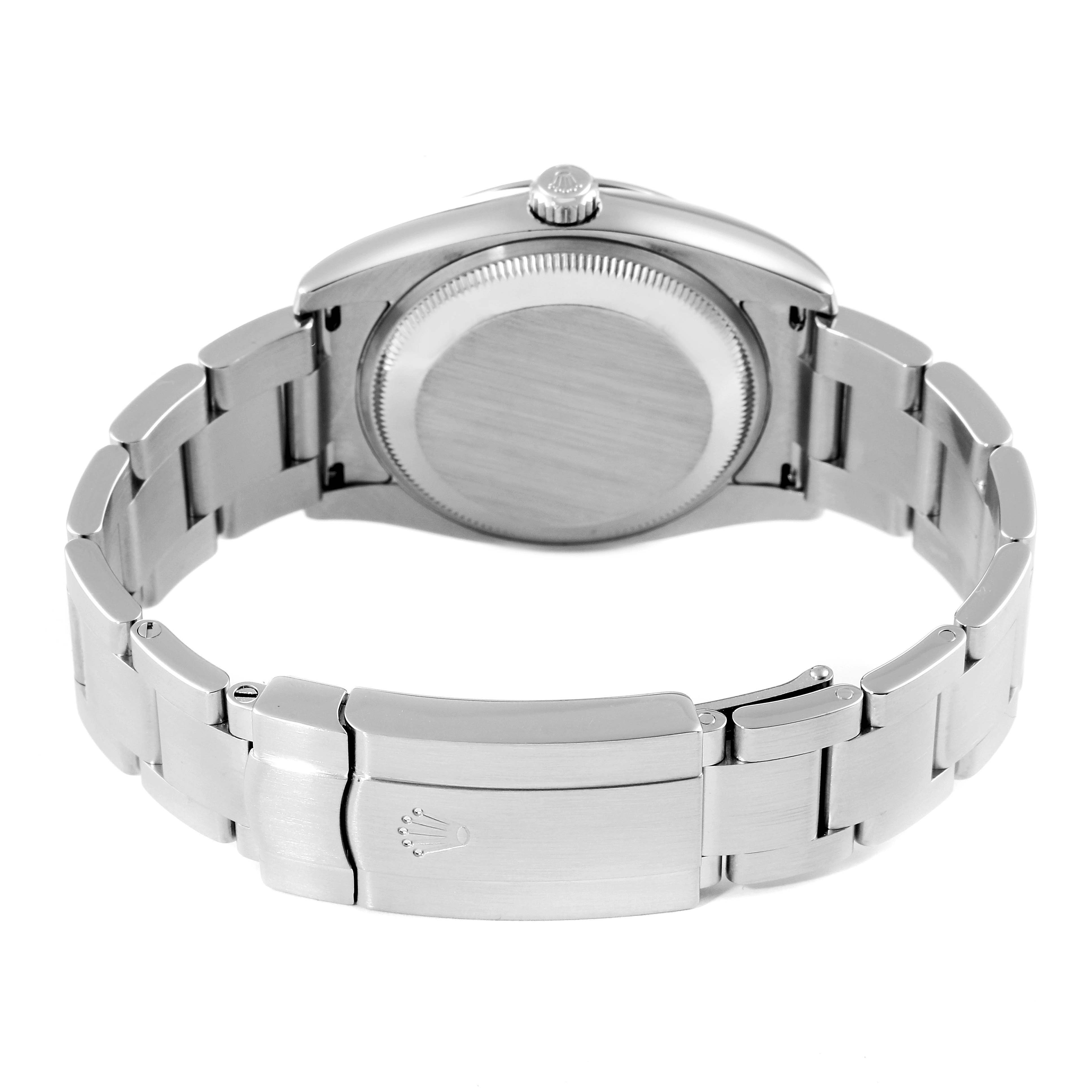 The image shows the back view of a Rolex Air-King 114200 Men's Stainless Steel White Dial 114200 Men's Stainless Steel White Dial watch, highlighting the case, crown, and bracelet with the clasp.