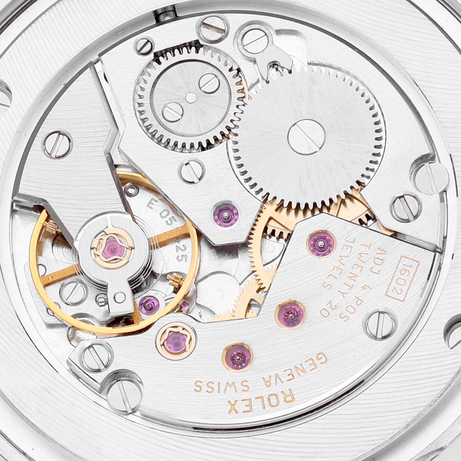 This image shows the internal mechanism of a Rolex Cellini 5115 Men's White Gold Silver Dial 5115 Men's White Gold Silver Dial watch, featuring gears, jewels, and the engraved brand name.