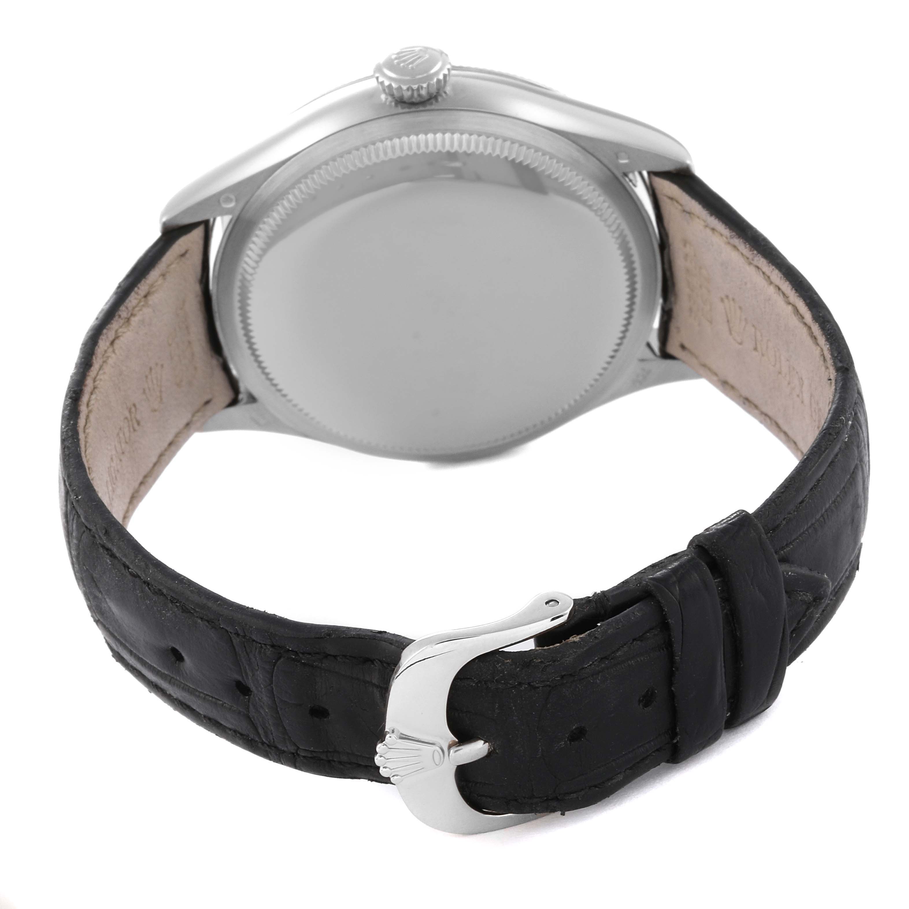 The image shows the back view of a Rolex Cellini 50509 Men's White Gold White Dial 50509 Men's White Gold White Dial watch, focusing on the case, crown, and leather strap with the clasp.