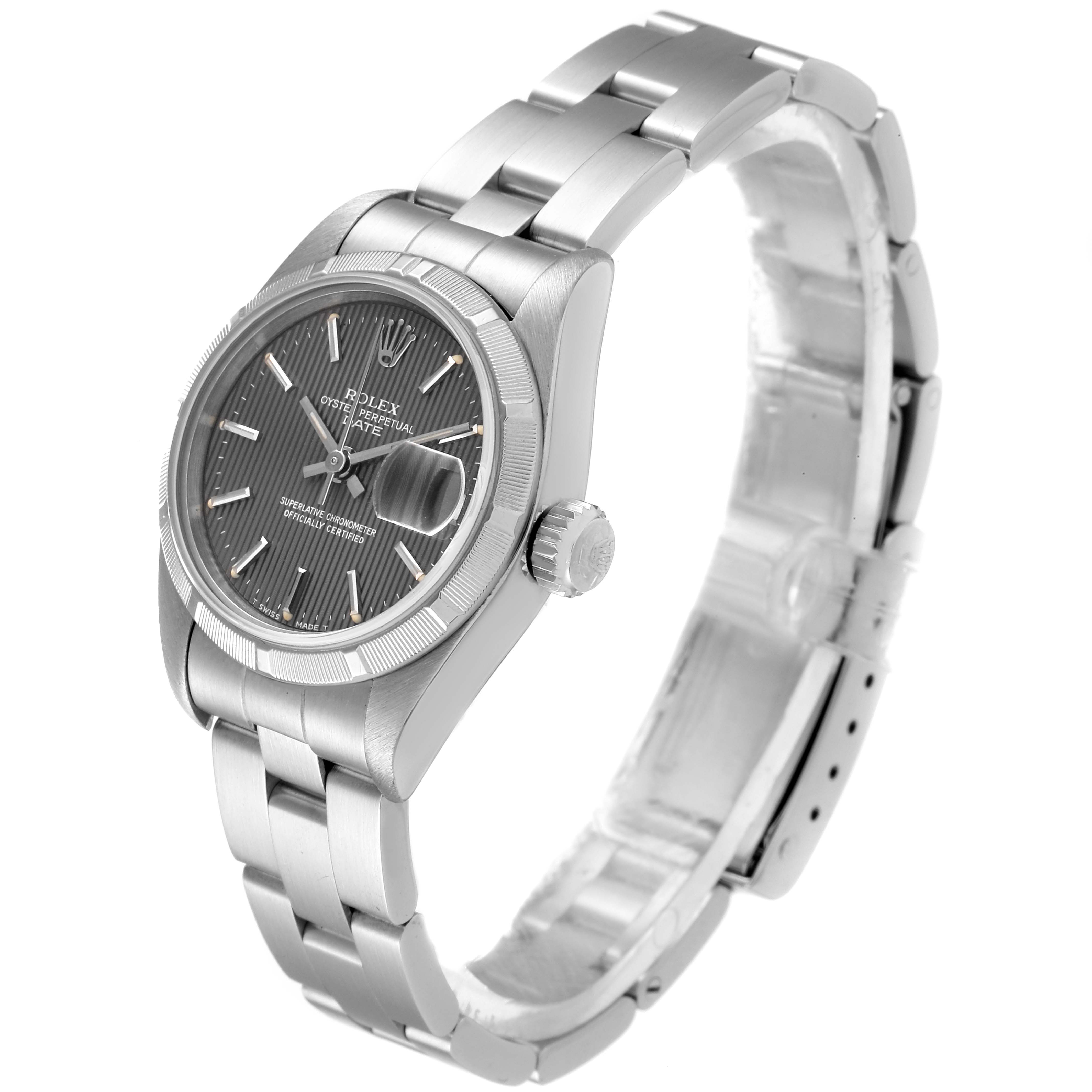 The watch shown is a Rolex Date 69190 Women's Stainless Steel Grey Dial 69190 Women's Stainless Steel Grey Dial model, viewed at a three-quarter angle, showing the dial, case, crown, and bracelet.