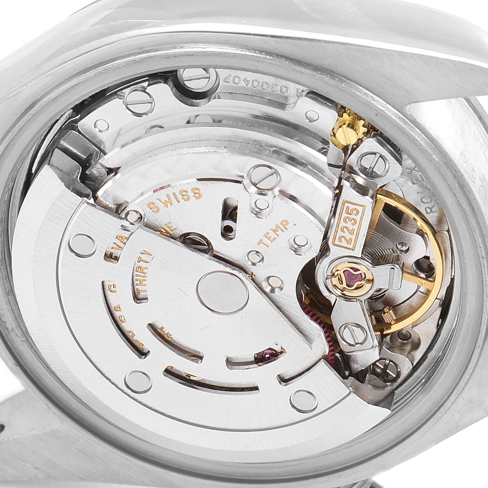 The image shows the movement and internal mechanism of a Rolex Date 79190 Women
s Stainless Steel White Dial 79190 Women
s Stainless Steel White Dial model watch from a close-up angle.