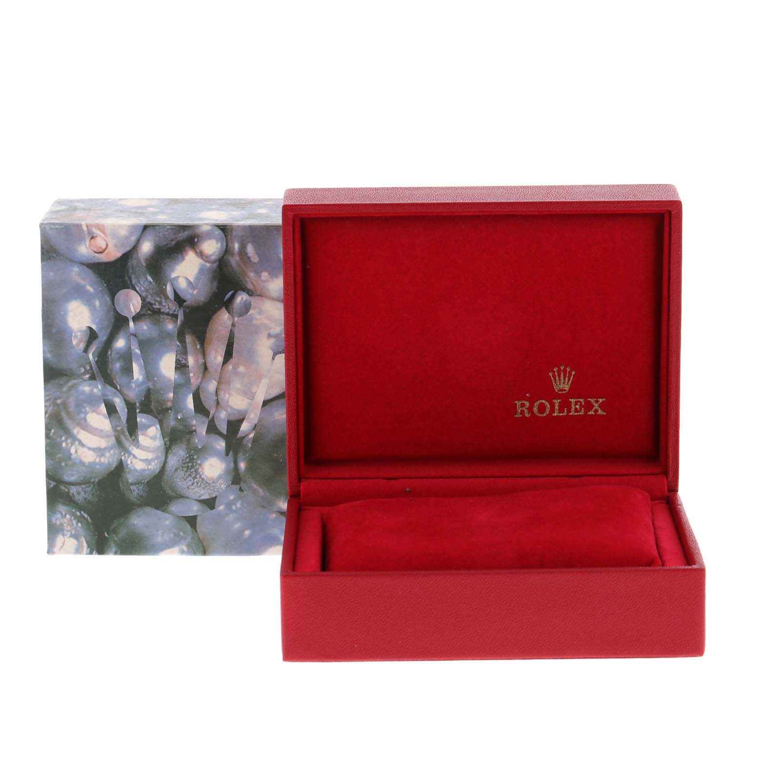 This is a Rolex Date 79190 Women
s Stainless Steel White Dial 79190 Women
s Stainless Steel White Dial model watch box and packaging, showing an open red box with the Rolex logo inside and the outer packaging.