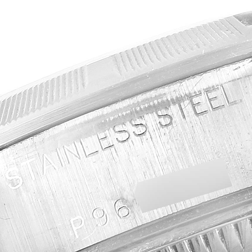 The image shows a close-up of the stainless steel case back and bezel of the Rolex Date 79190 Women
s Stainless Steel White Dial 79190 Women
s Stainless Steel White Dial model watch.