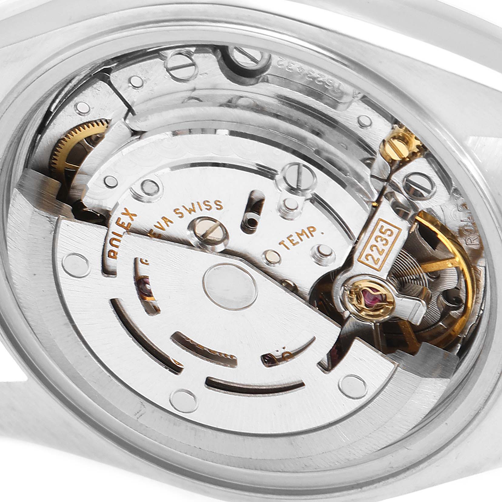 The image shows the inner mechanism of the Rolex Datejust 79174 Women
s Stainless Steel Silver Dial 79174 Women
s Stainless Steel Silver Dial watch, including the movement and gears.