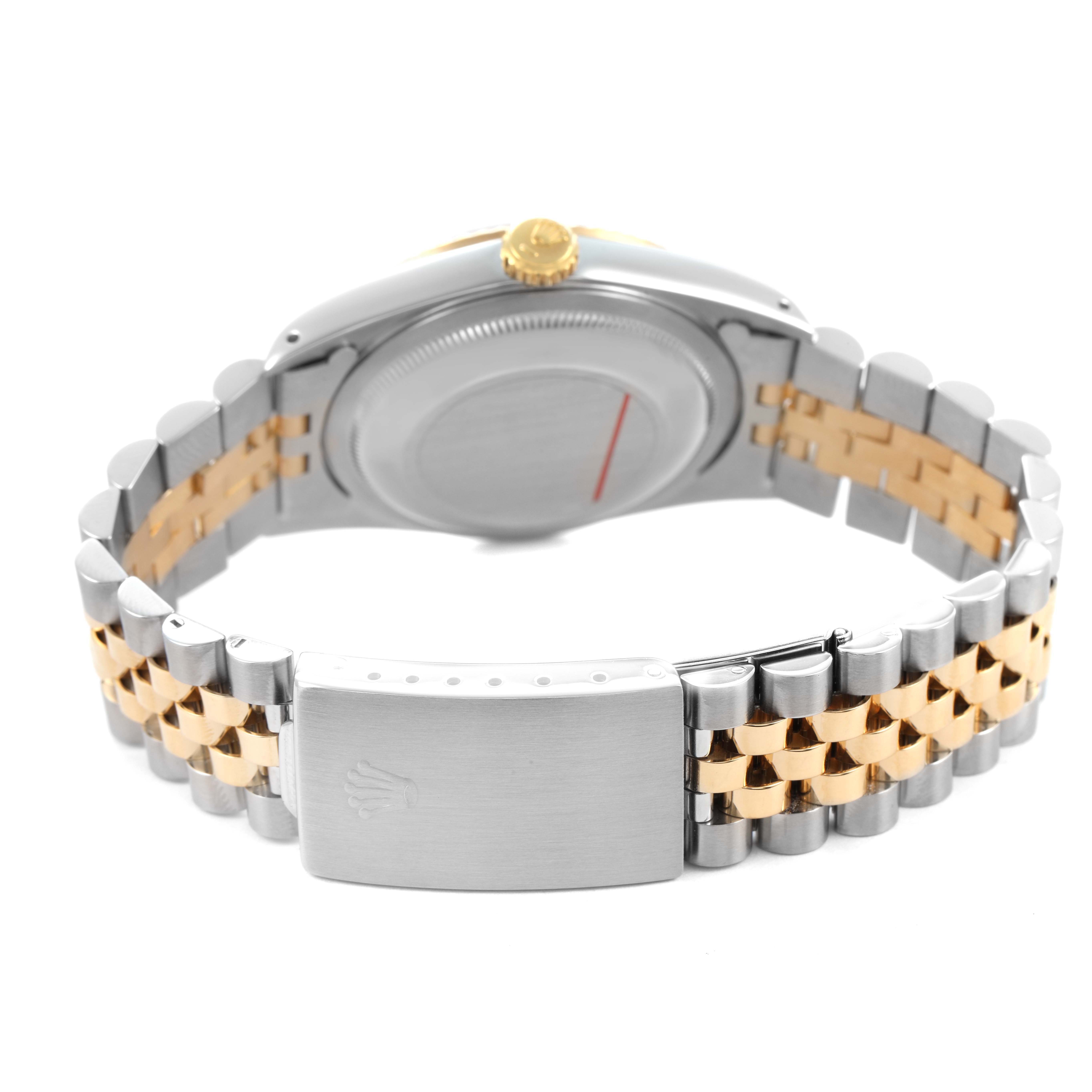 The image shows the Rolex Datejust 16233 Men's Steel and Gold (two tone) Champagne Dial watch from the back, highlighting its two-tone bracelet and clasp.