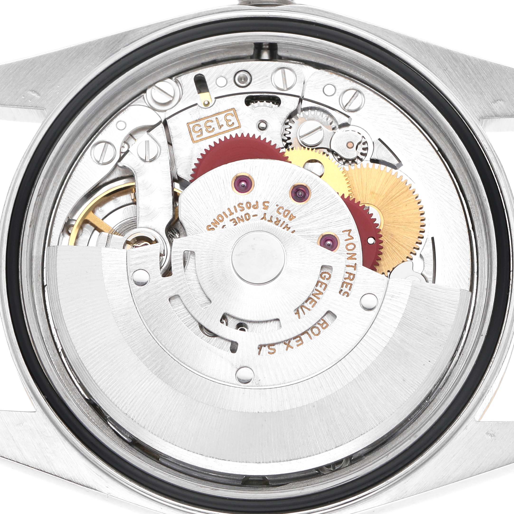 The image shows the internal movement mechanism of a Rolex Datejust 16233 Men's Steel and Gold (two tone) Champagne Dial watch from a back view, highlighting gears and rotors.