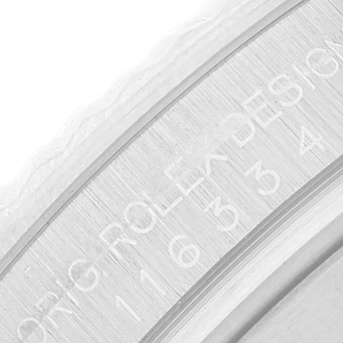 This image shows a close-up of the engraved inner bezel from the Datejust 41 model by Rolex.