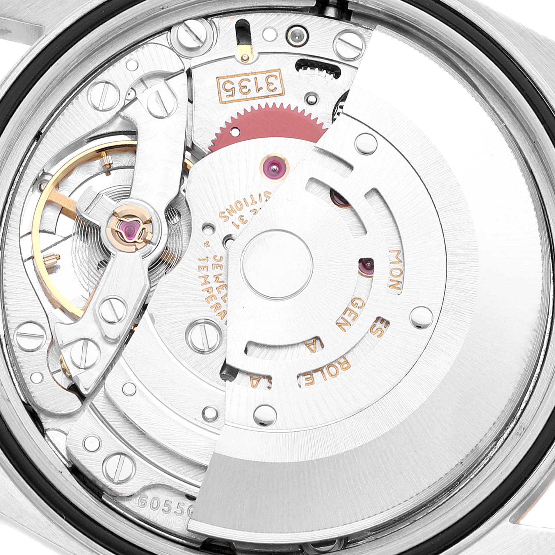 This is a close-up view of the movement inside a Rolex Datejust 16233 Men's Steel and Gold (two tone) Black Dial 16233 Men's Steel and Gold (two tone) Black Dial watch, showcasing its mechanical parts.
