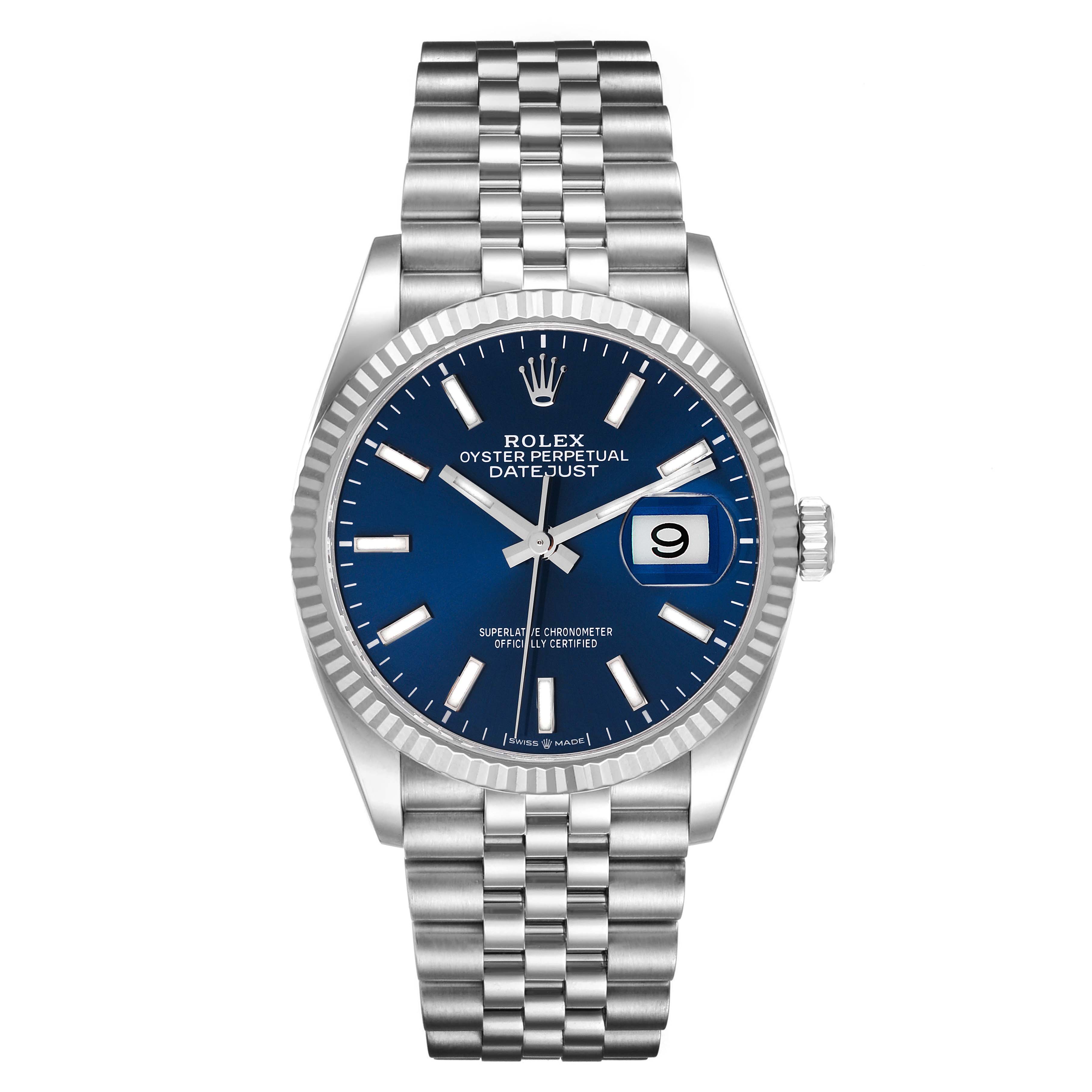 The image shows a Rolex Datejust 126234 Men's Steel and Gold (two tone)  126234 Men's Steel and Gold (two tone)  watch from a front angle, highlighting its blue dial, fluted bezel, jubilee bracelet, and cyclops date window.