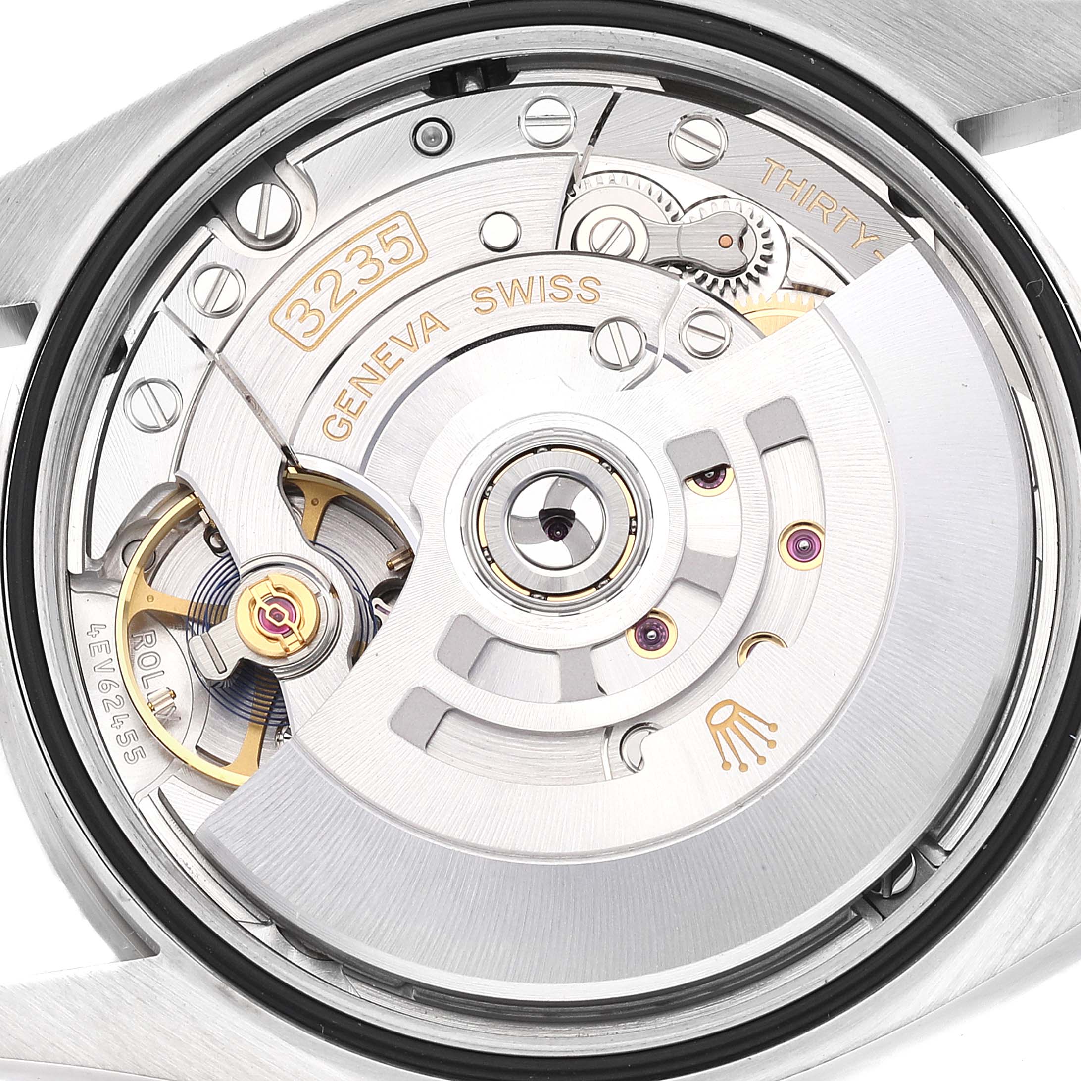 The image shows the intricate internal mechanism of a Rolex Datejust 126234 Men's Steel and Gold (two tone)  126234 Men's Steel and Gold (two tone)  watch from the back angle, highlighting its caliber 3235 movement.