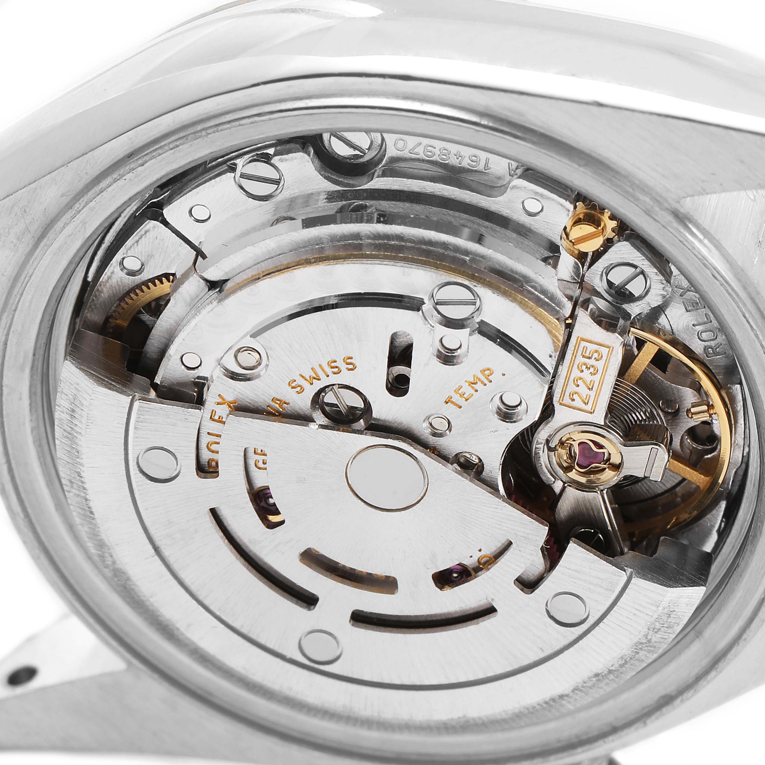 The image shows a close-up view of the Rolex Datejust 79174 Women
s Stainless Steel Silver Dial 79174 Women
s Stainless Steel Silver Dial model
s internal mechanical movement.