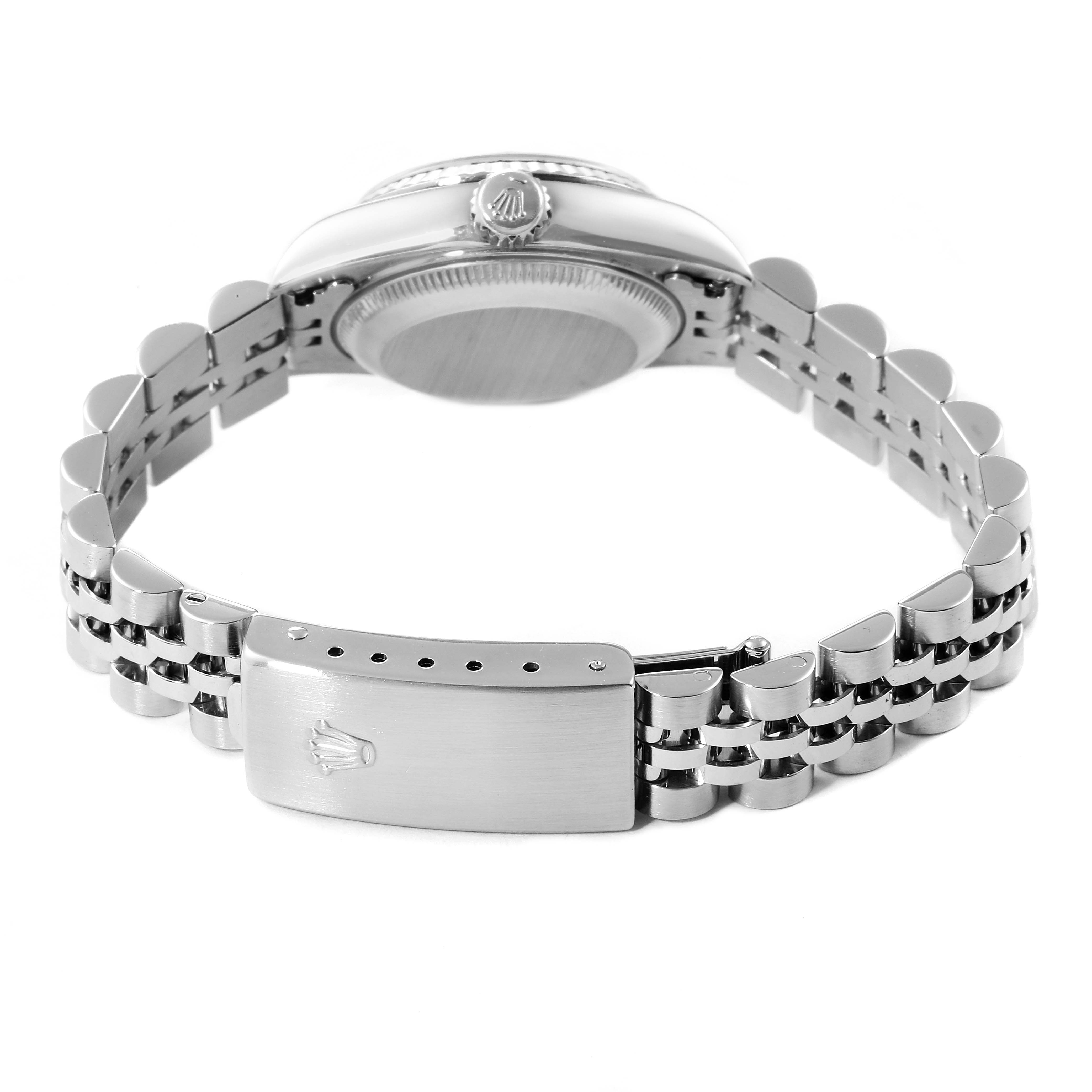 This image shows the back case, crown, and bracelet clasp of a Rolex Datejust 79174 Women
s Stainless Steel Silver Dial 79174 Women
s Stainless Steel Silver Dial watch from a rear angle.