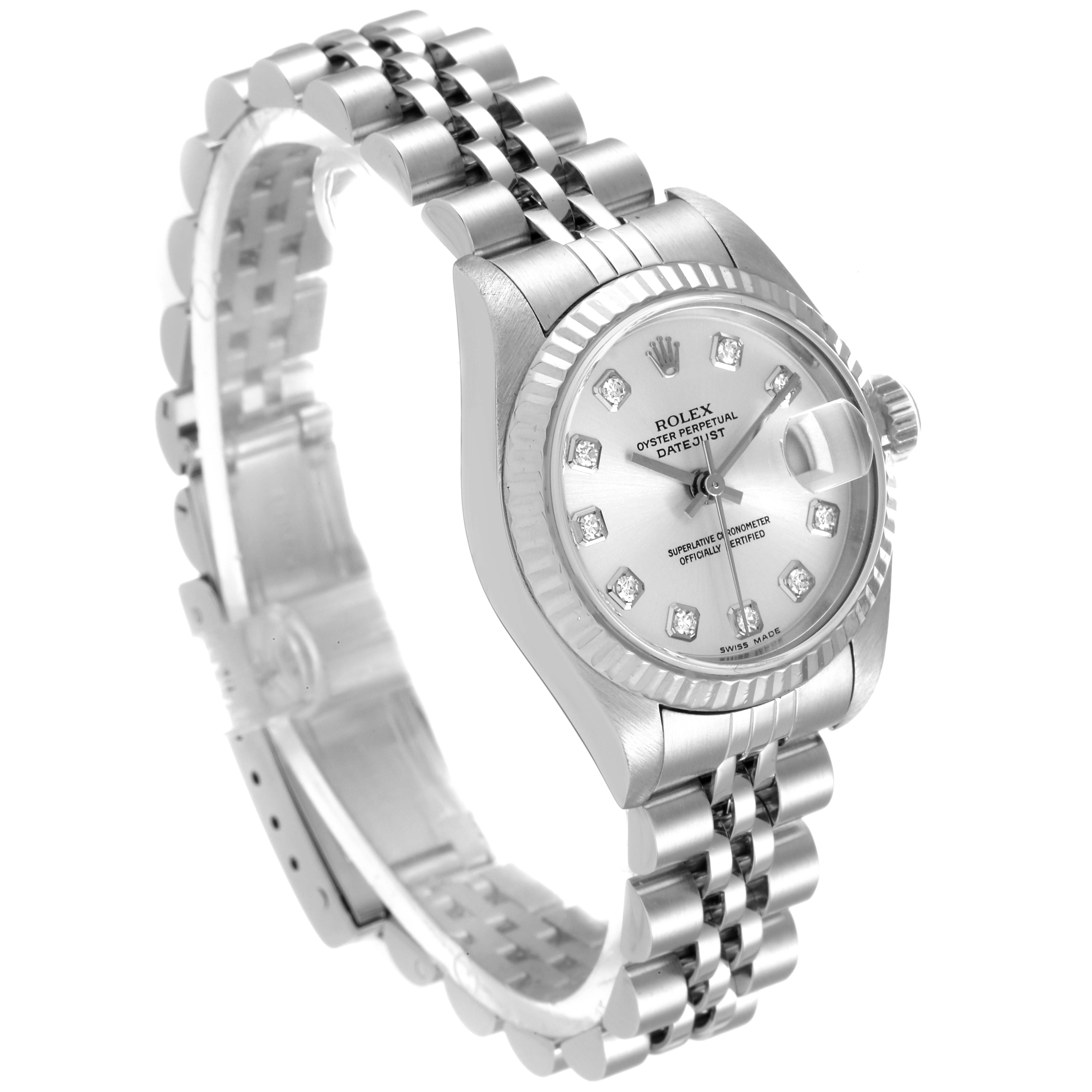 The image shows a Rolex Datejust 79174 Women
s Stainless Steel Silver Dial 79174 Women
s Stainless Steel Silver Dial watch at an angle displaying the face, bezel, and bracelet.