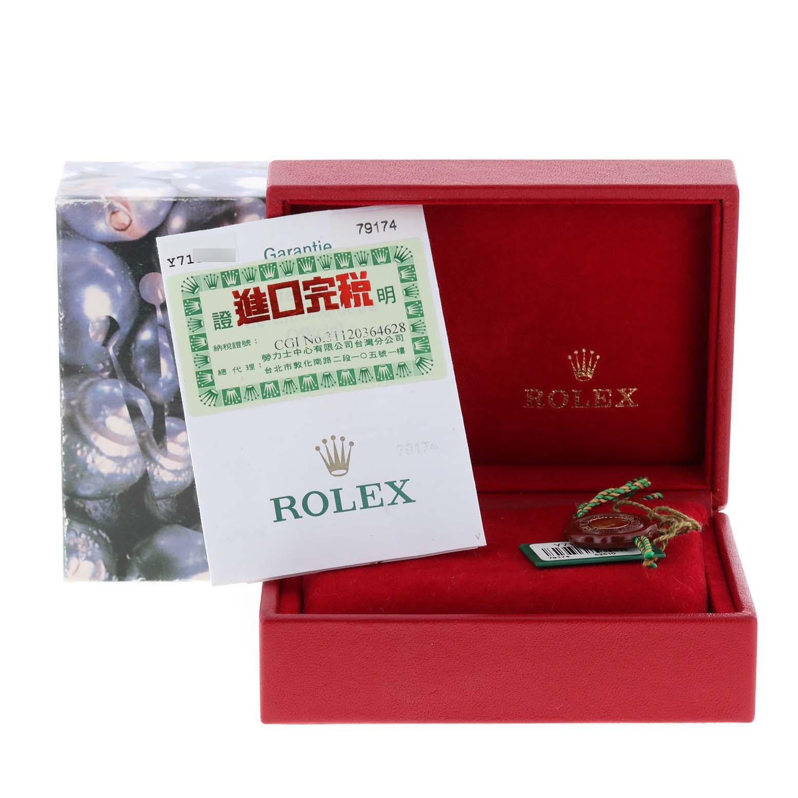 The image shows a Rolex Datejust 79174 Women
s Stainless Steel Silver Dial 79174 Women
s Stainless Steel Silver Dial watch box, warranty card, and accessories from a front angle.