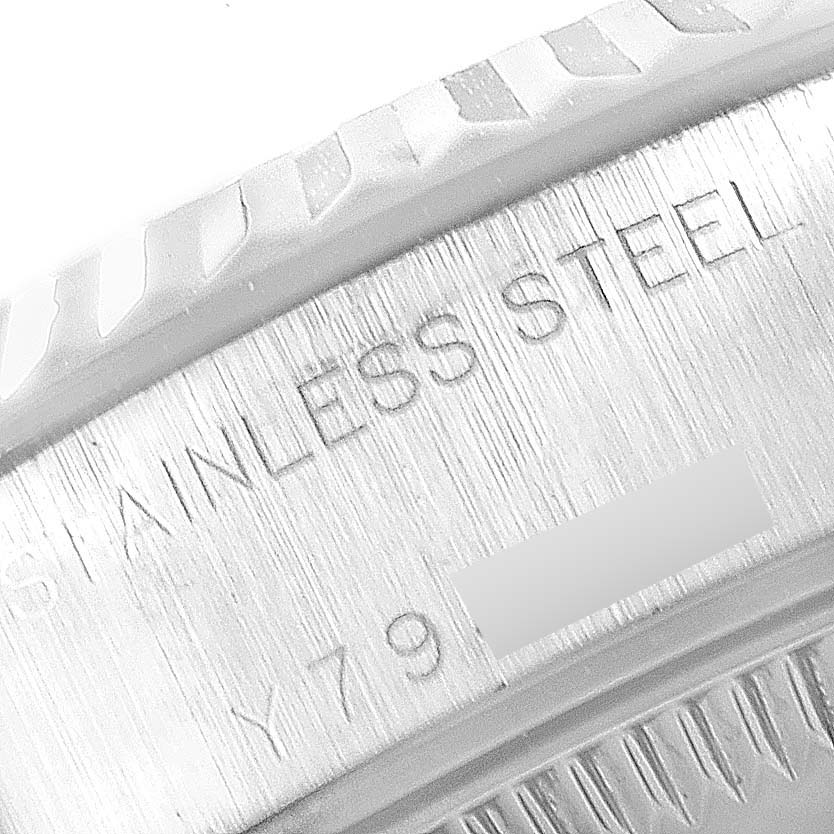 This close-up shows the stainless steel case and fluted bezel of a Rolex Datejust 79174 Women
s Stainless Steel Silver Dial 79174 Women
s Stainless Steel Silver Dial model.