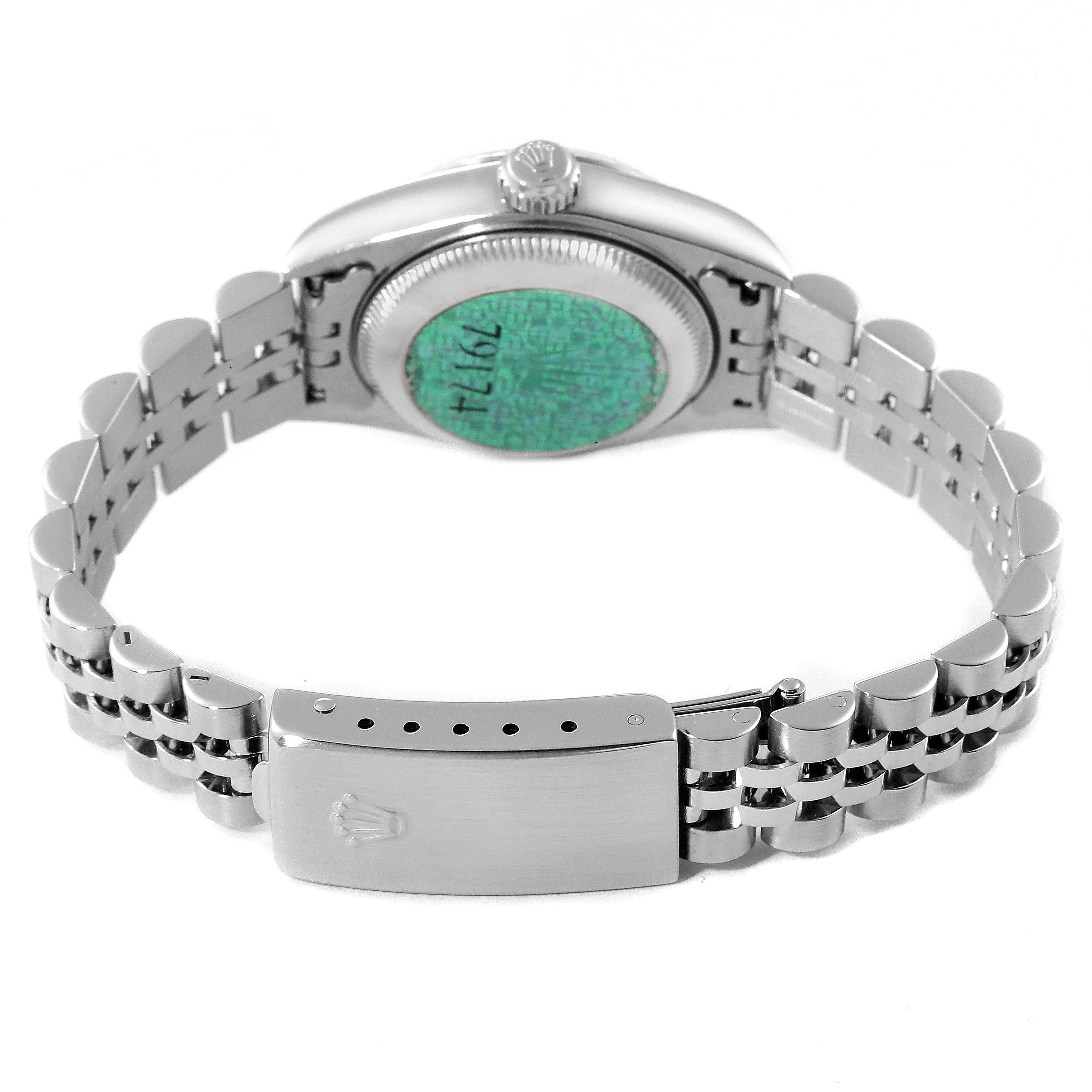 The image shows the back view and bracelet of a Rolex Datejust 79174 Women
s Stainless Steel Silver Dial 79174 Women
s Stainless Steel Silver Dial watch, highlighting the clasp and case back.