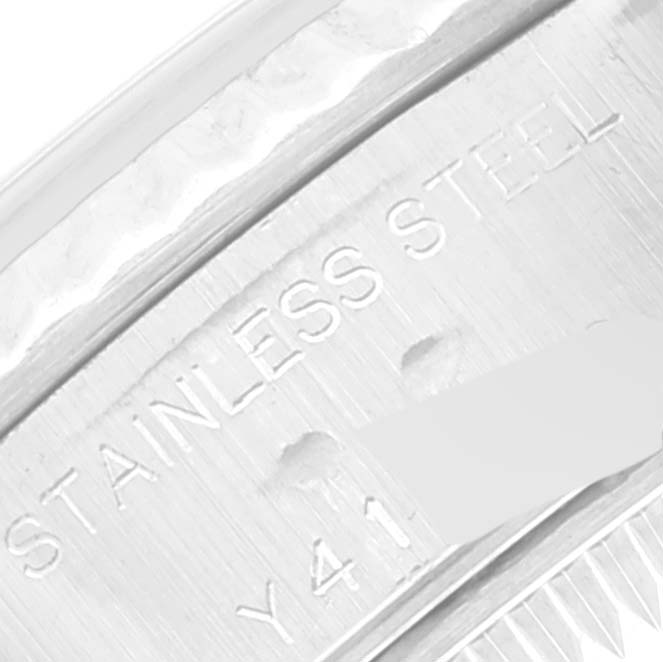 Close-up image of the Rolex Datejust 79174 Women's Stainless Steel Pink Dial 79174 Women's Stainless Steel Pink Dial watch's engraving on the stainless steel case.