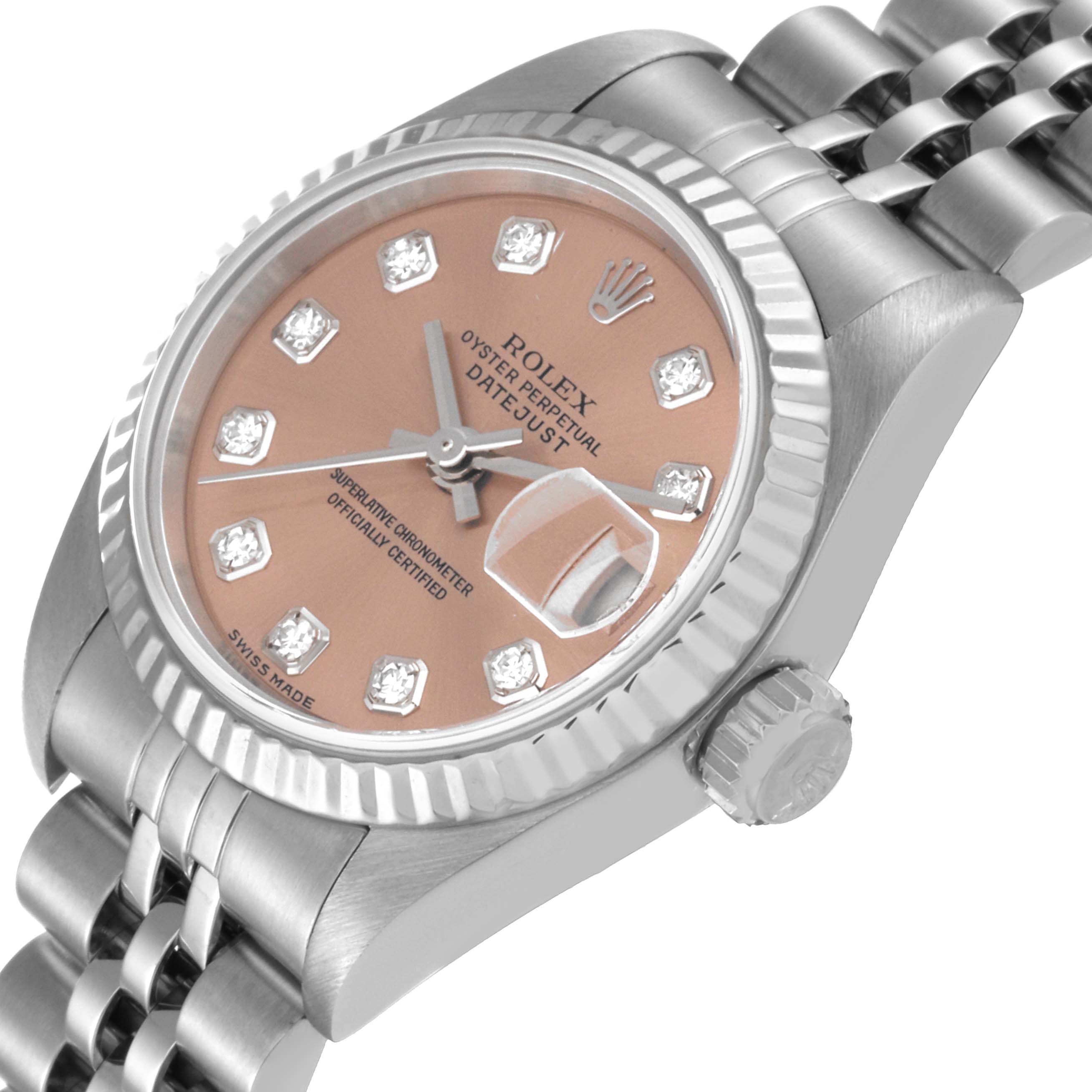 The image shows a close-up, angled view of the Rolex Datejust 79174 Women's Stainless Steel Pink Dial 79174 Women's Stainless Steel Pink Dial, highlighting its dial, bezel, crown, and part of the bracelet.