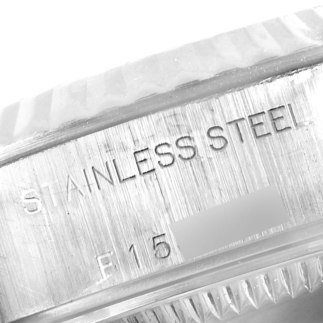 This image shows a close-up of the stainless steel case of a Rolex Datejust 79174 Women's Stainless Steel Silver Dial 79174 Women's Stainless Steel Silver Dial watch.
