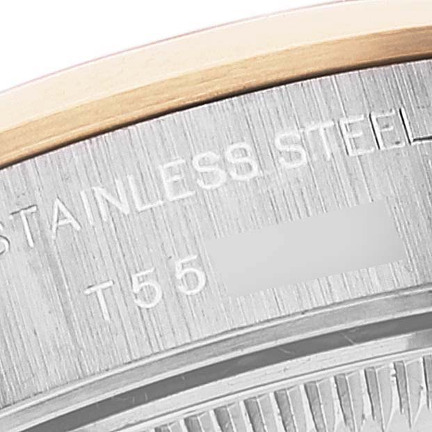 The image shows a close-up of the back of a Rolex Datejust 69163 Women
s Steel and Gold (two tone) Blue Dial 69163 Women
s Steel and Gold (two tone) Blue Dial watch, focusing on the stainless steel engraving.