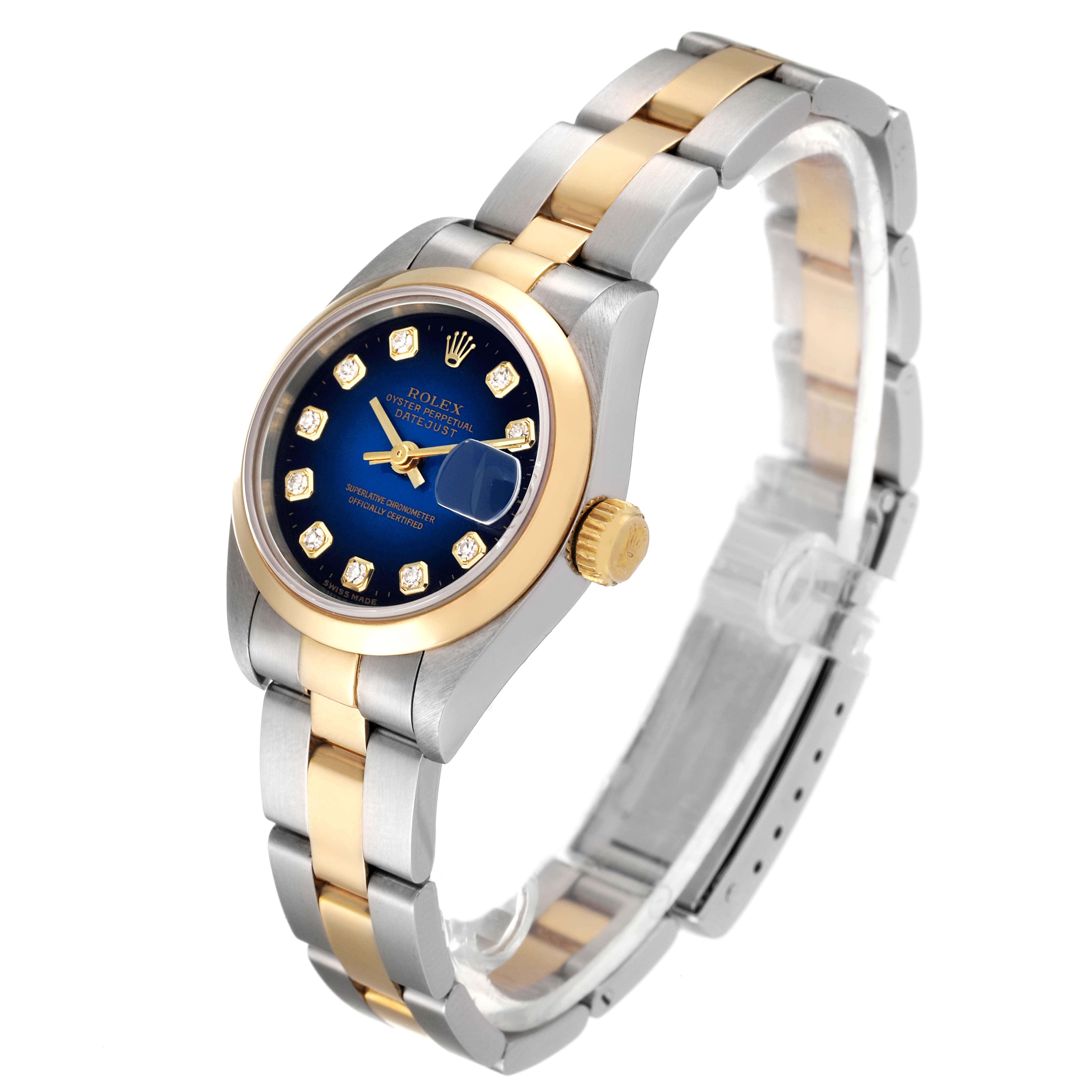The image shows a Rolex Datejust 69163 Women
s Steel and Gold (two tone) Blue Dial 69163 Women
s Steel and Gold (two tone) Blue Dial watch angled from the front, displaying its face, dial, bezel, crown, bracelet, and clasp.