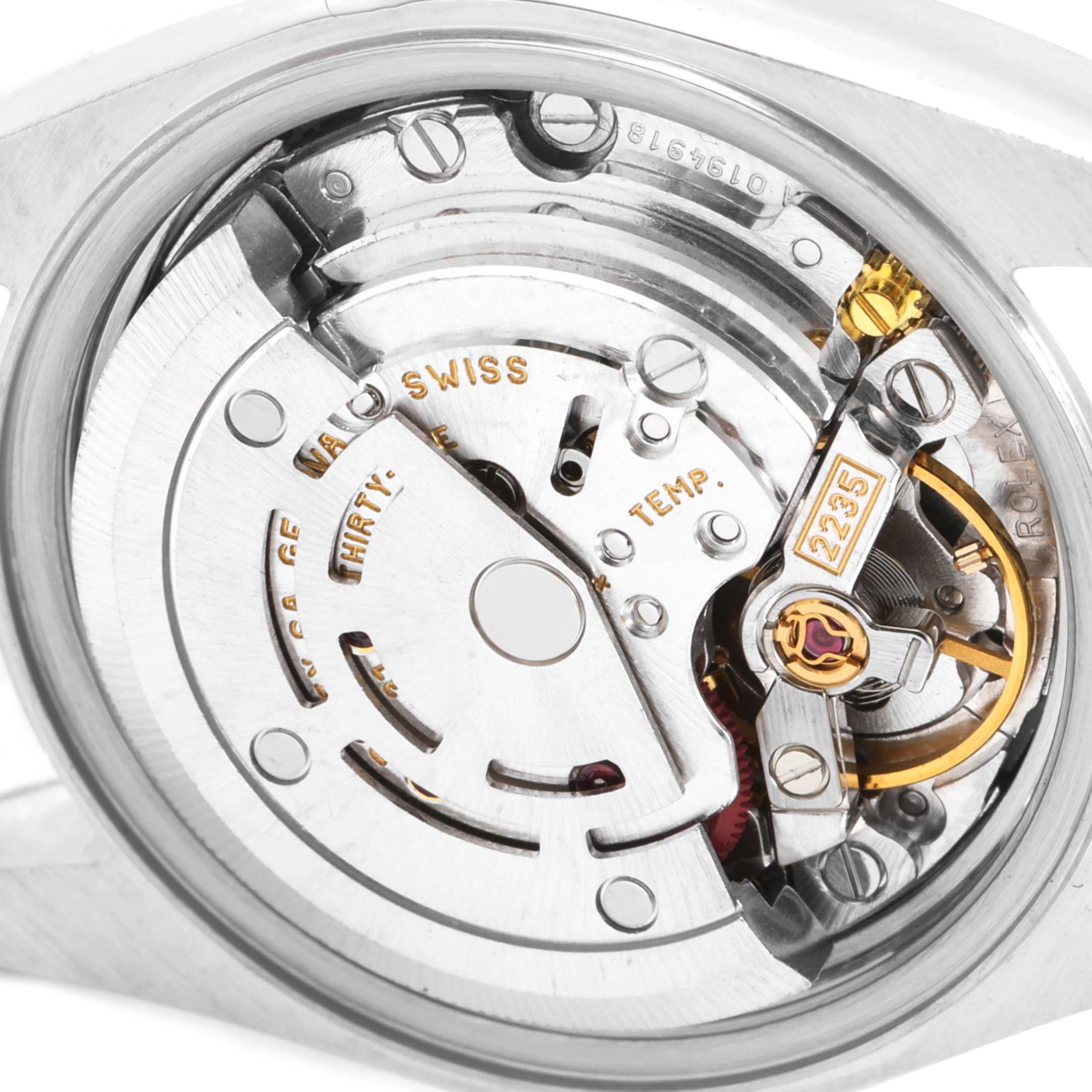 This image shows the movement mechanism of a Rolex Datejust 79173 Women
s Steel and Gold (two tone) Silver Dial 79173 Women
s Steel and Gold (two tone) Silver Dial watch from the back, highlighting the intricate components.