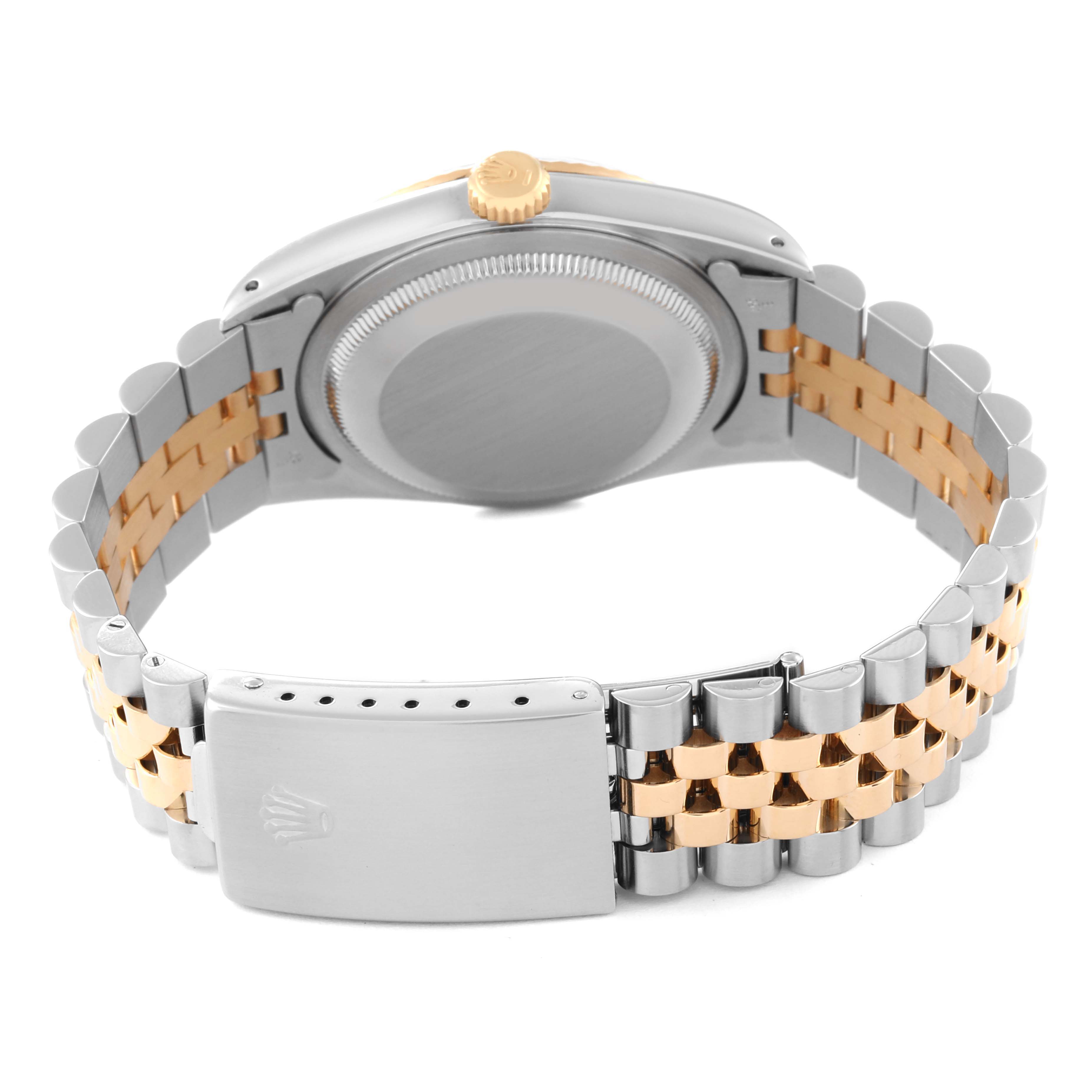 The image shows the back side of a Rolex Datejust 16233 Men's Steel and Gold (two tone) Champagne Dial 16233 Men's Steel and Gold (two tone) Champagne Dial watch, highlighting the case back and two-tone metal bracelet with clasp.