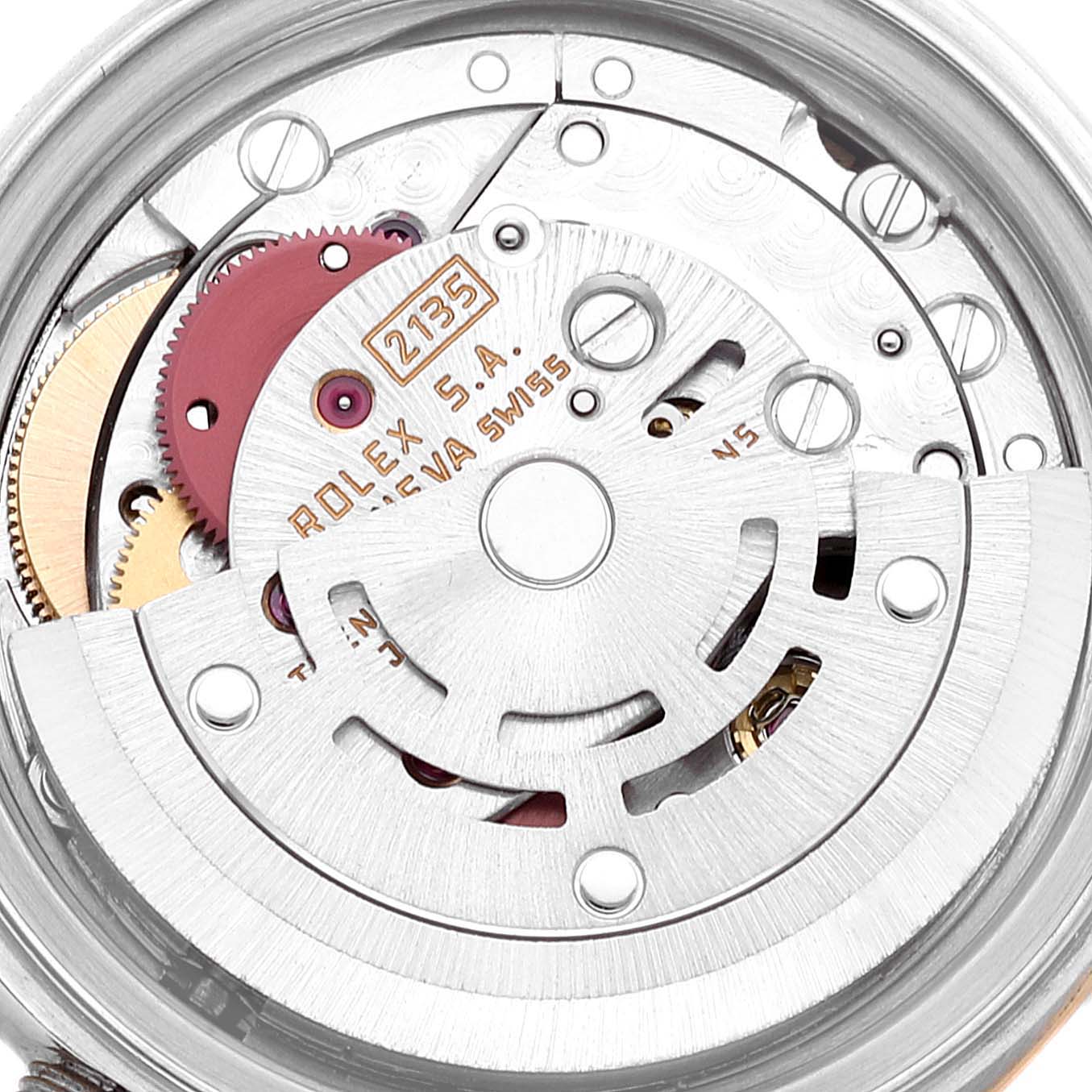 This image shows the movement mechanism of the Rolex Datejust 69173 Women's Steel and Gold (two tone) Champagne Dial 69173 Women's Steel and Gold (two tone) Champagne Dial watch model 2135 from a close-up angle.