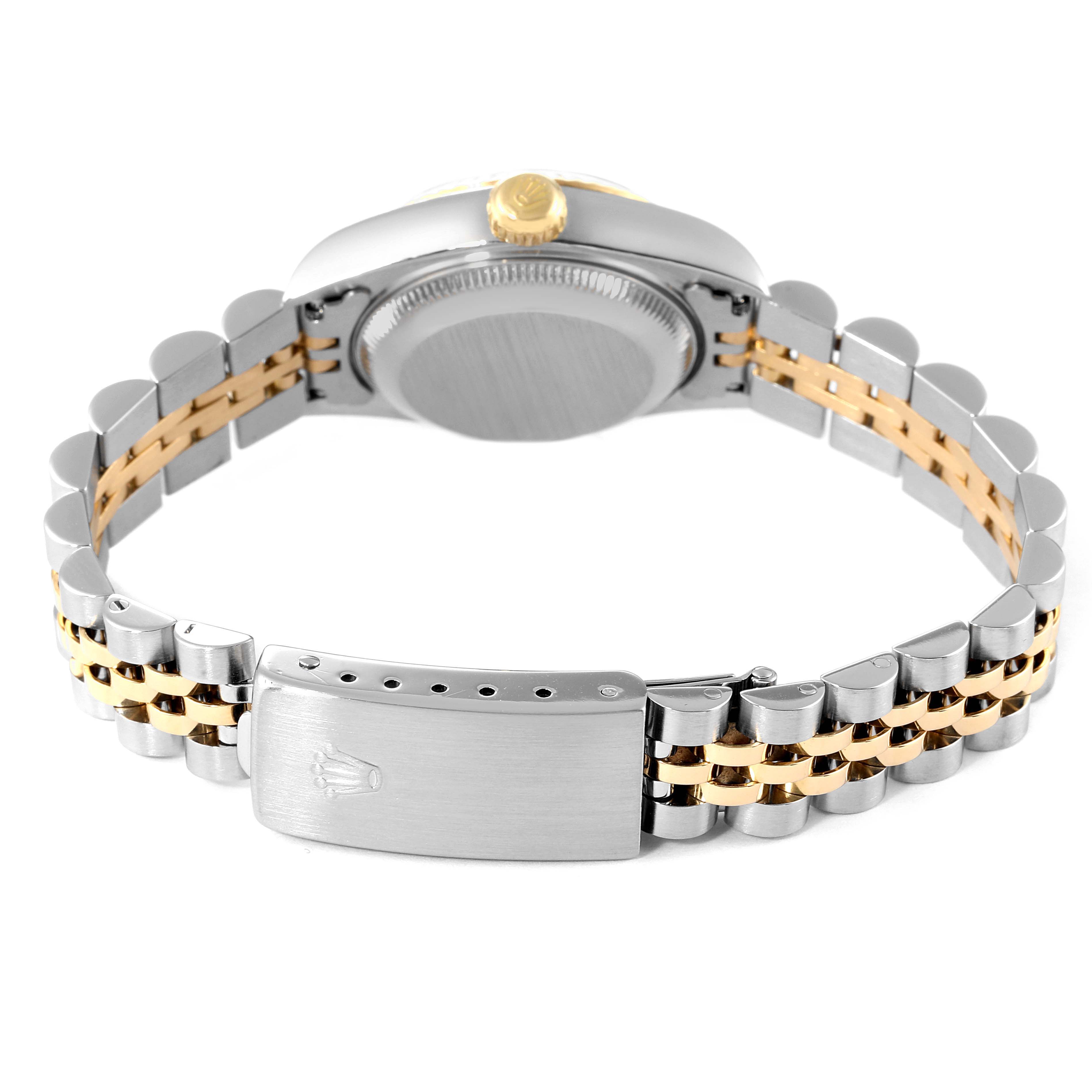The image shows the back of a Rolex Datejust 69173 Women
s Steel and Gold (two tone) Champagne Dial 69173 Women
s Steel and Gold (two tone) Champagne Dial watch, highlighting the clasp and two-tone bracelet.