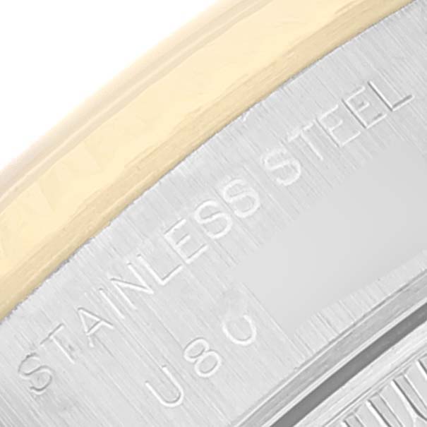 The image shows a close-up view of the side and back casing of a Rolex Datejust 69173 Women
s Steel and Gold (two tone) Champagne Dial 69173 Women
s Steel and Gold (two tone) Champagne Dial watch, highlighting the "Stainless Steel" engraving.