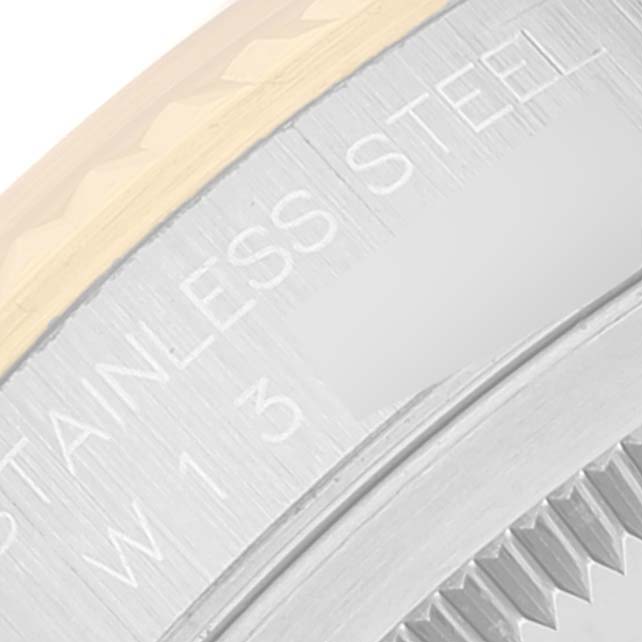 The image shows a close-up of the stainless steel bezel and part of the strap for a Rolex Datejust 16233 Men's Steel and Gold (two tone) Beige Dial 16233 Men's Steel and Gold (two tone) Beige Dial watch.