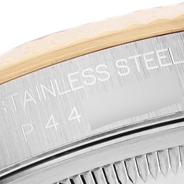 The image shows a close-up of the stainless steel case and bezel of a Rolex Datejust 16233 Men's Steel and Gold (two tone) Beige Dial 16233 Men's Steel and Gold (two tone) Beige Dial watch.