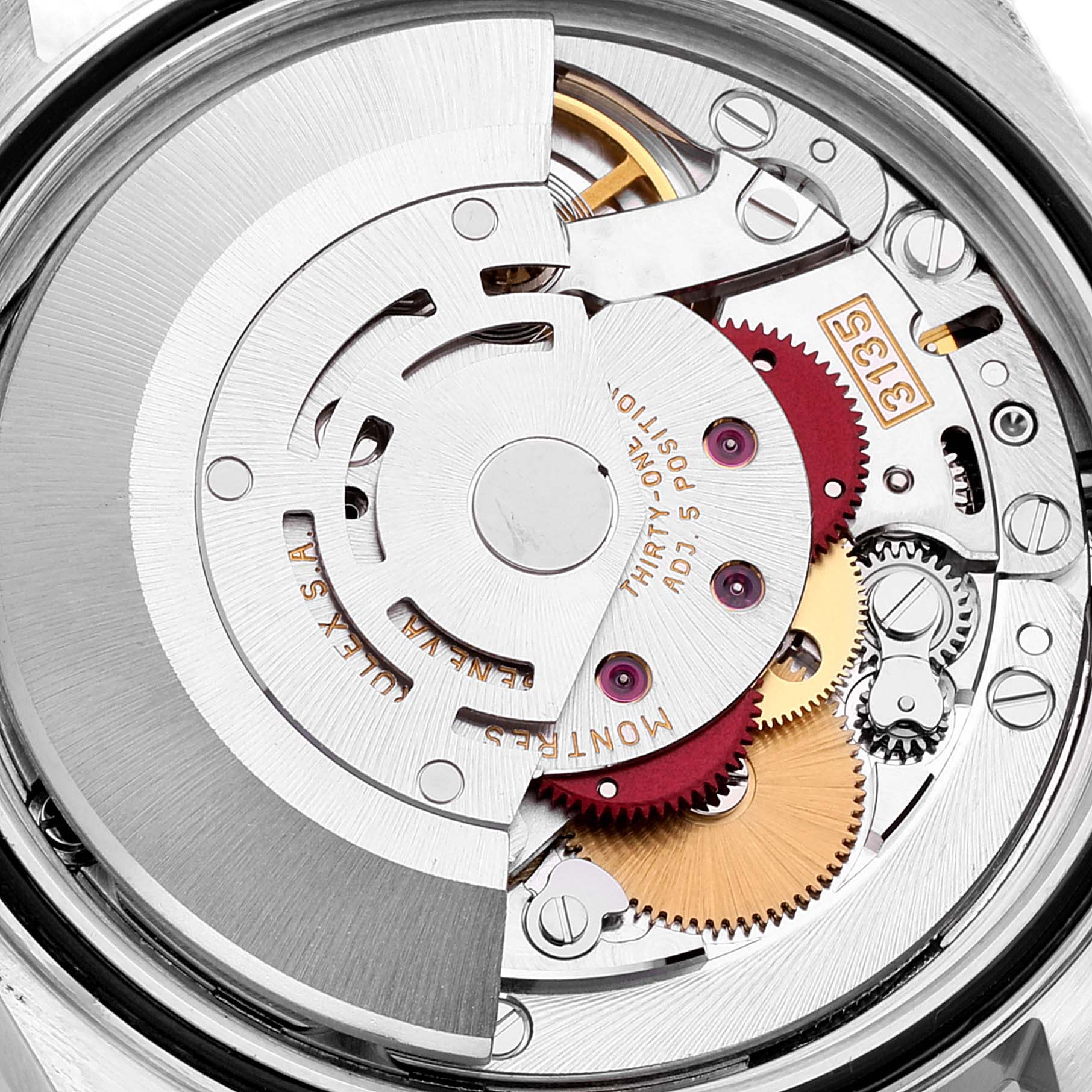 This is a close-up view of the movement mechanism inside a Rolex Datejust 16233 Men's Steel and Gold (two tone) Beige Dial 16233 Men's Steel and Gold (two tone) Beige Dial watch, showing gears and intricate parts.