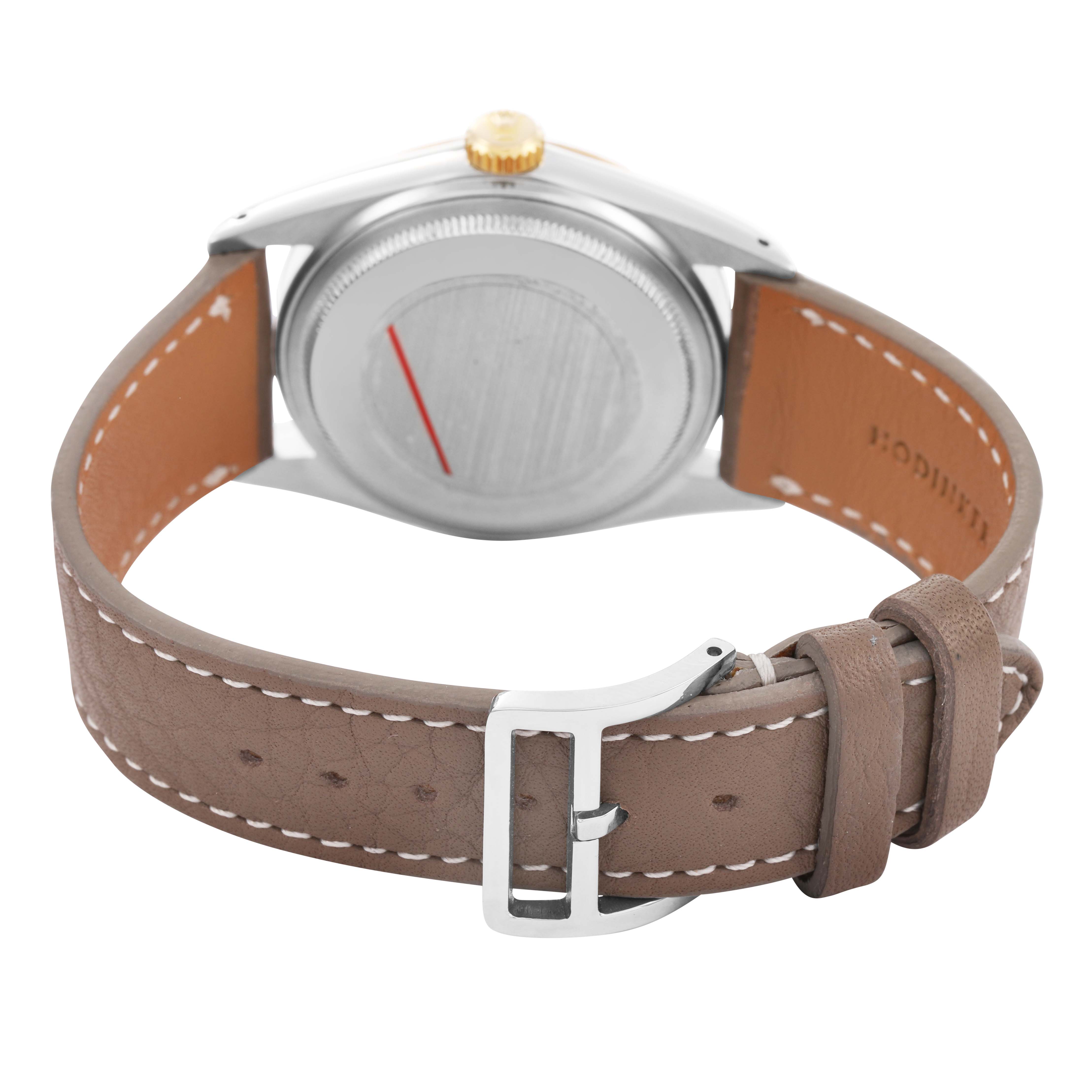 The image shows the back of the Rolex Datejust 16013 Men's Steel and Gold (two tone) Champagne Dial watch, featuring the case back, crown, and brown leather strap with a buckle.