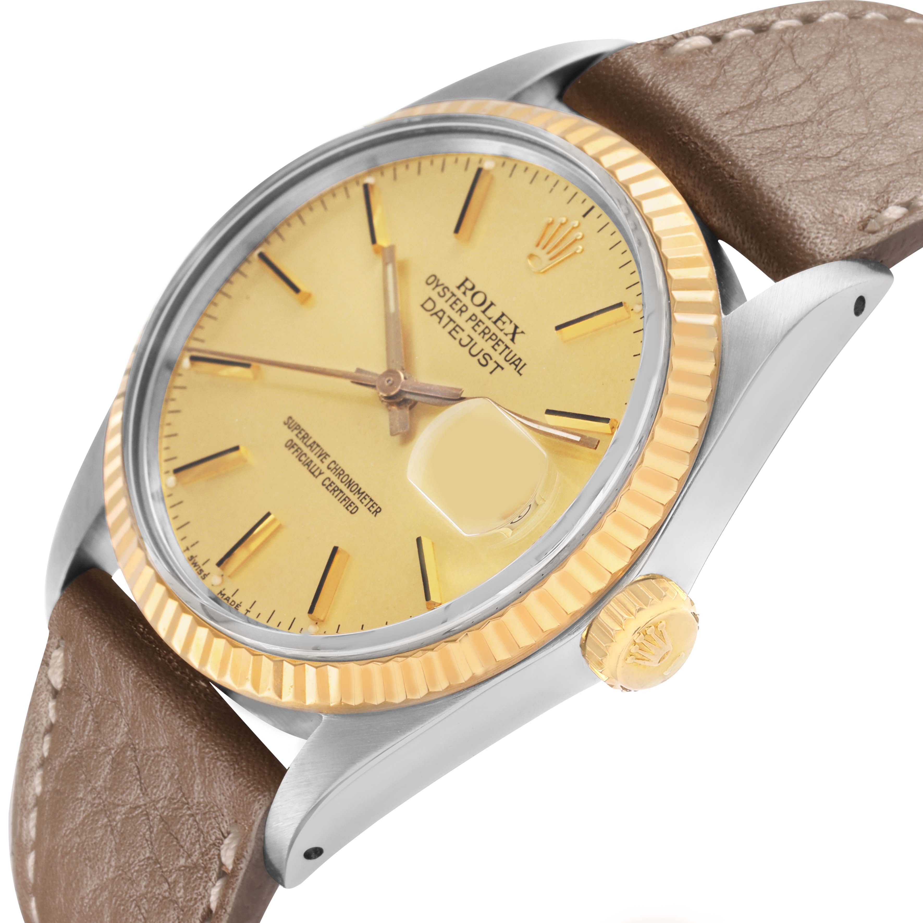 The Rolex Datejust 16013 Men's Steel and Gold (two tone) Champagne Dial is shown at an angle highlighting the dial, fluted bezel, crown, and leather strap.