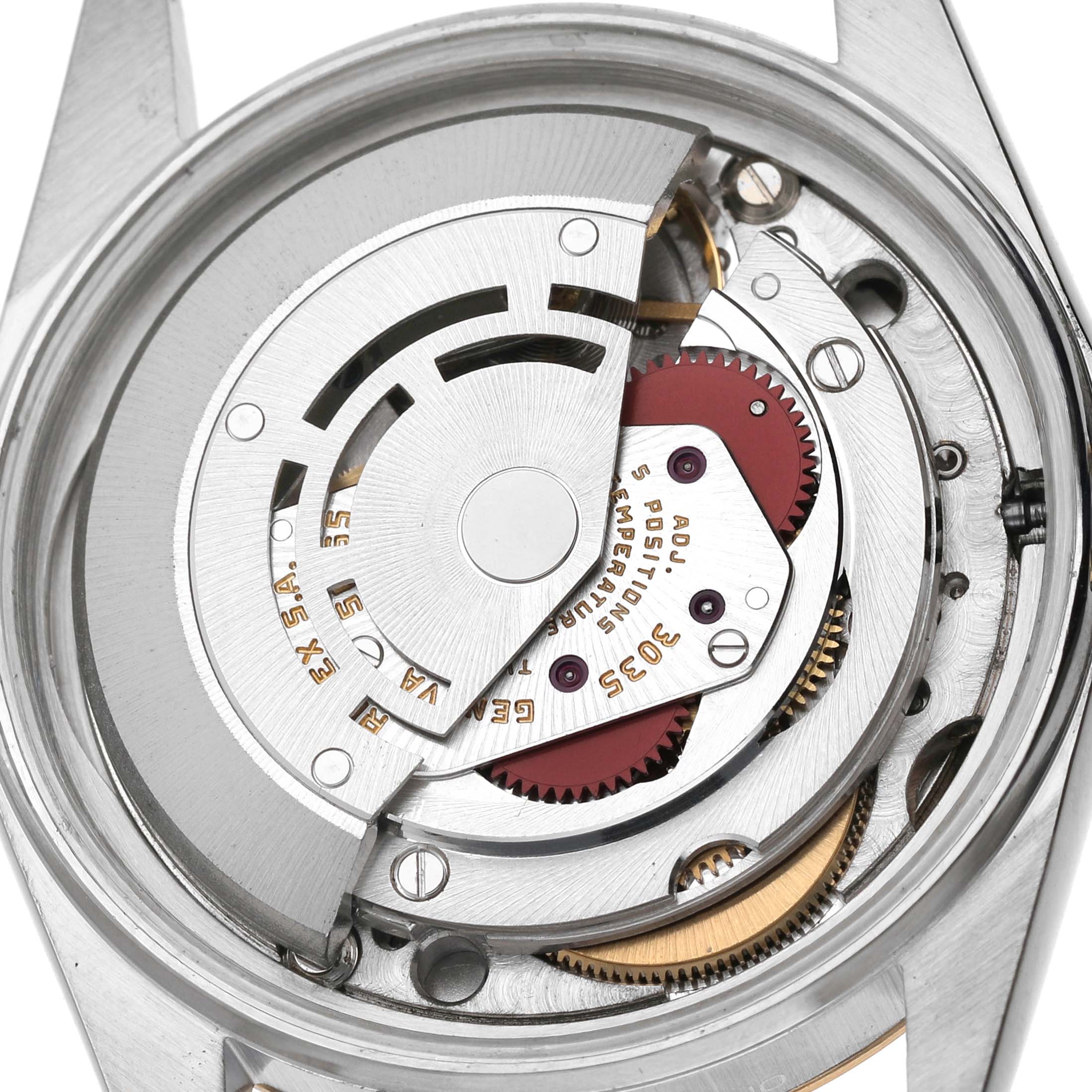 The image shows the internal mechanism of a Rolex Datejust 16013 Men's Steel and Gold (two tone) Champagne Dial, focusing on the rotor and movement components.