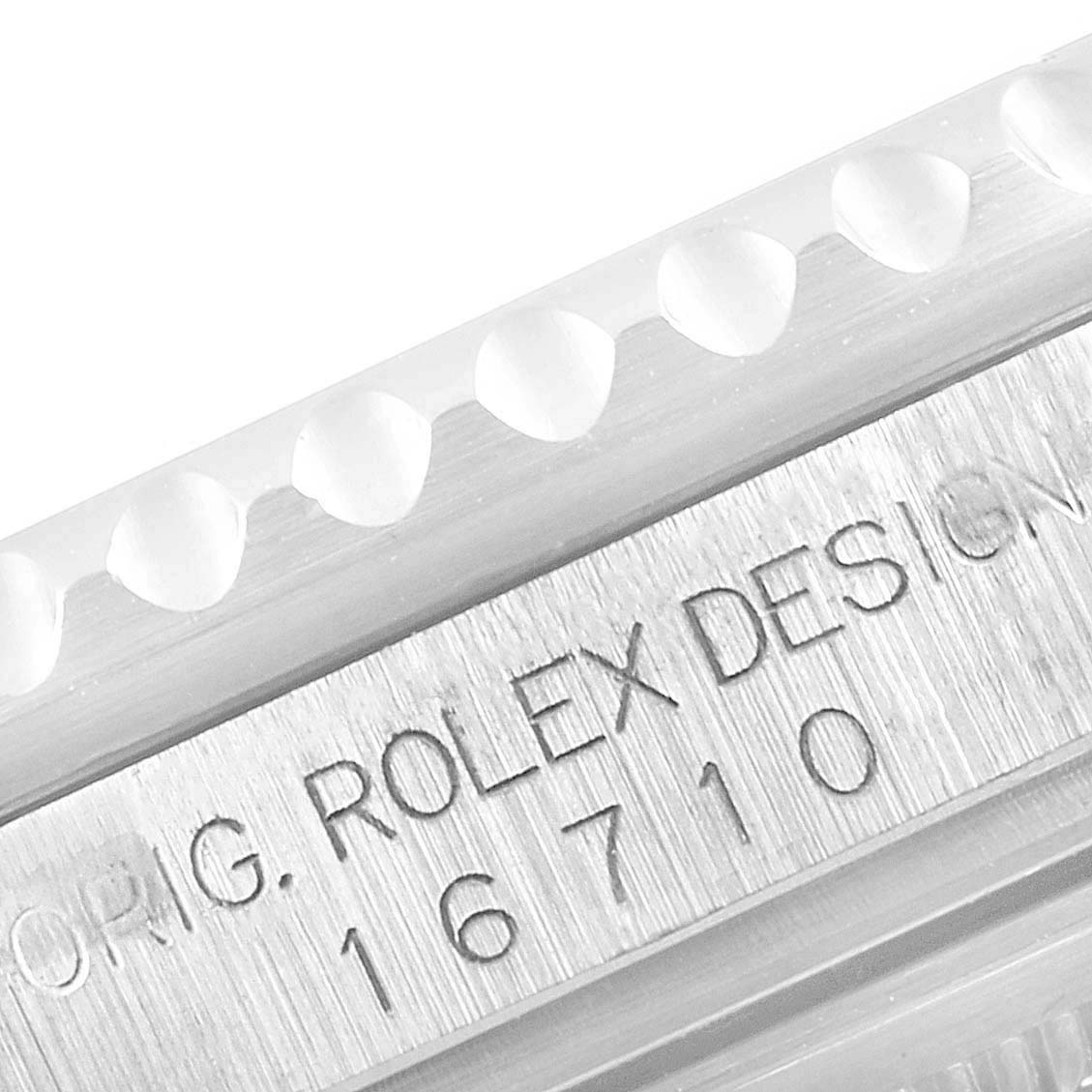 This close-up image shows the engraving on the case of a Rolex GMT-Master 16710 Men
s Stainless Steel Black Dial 16710 Men
s Stainless Steel Black Dial 16710.