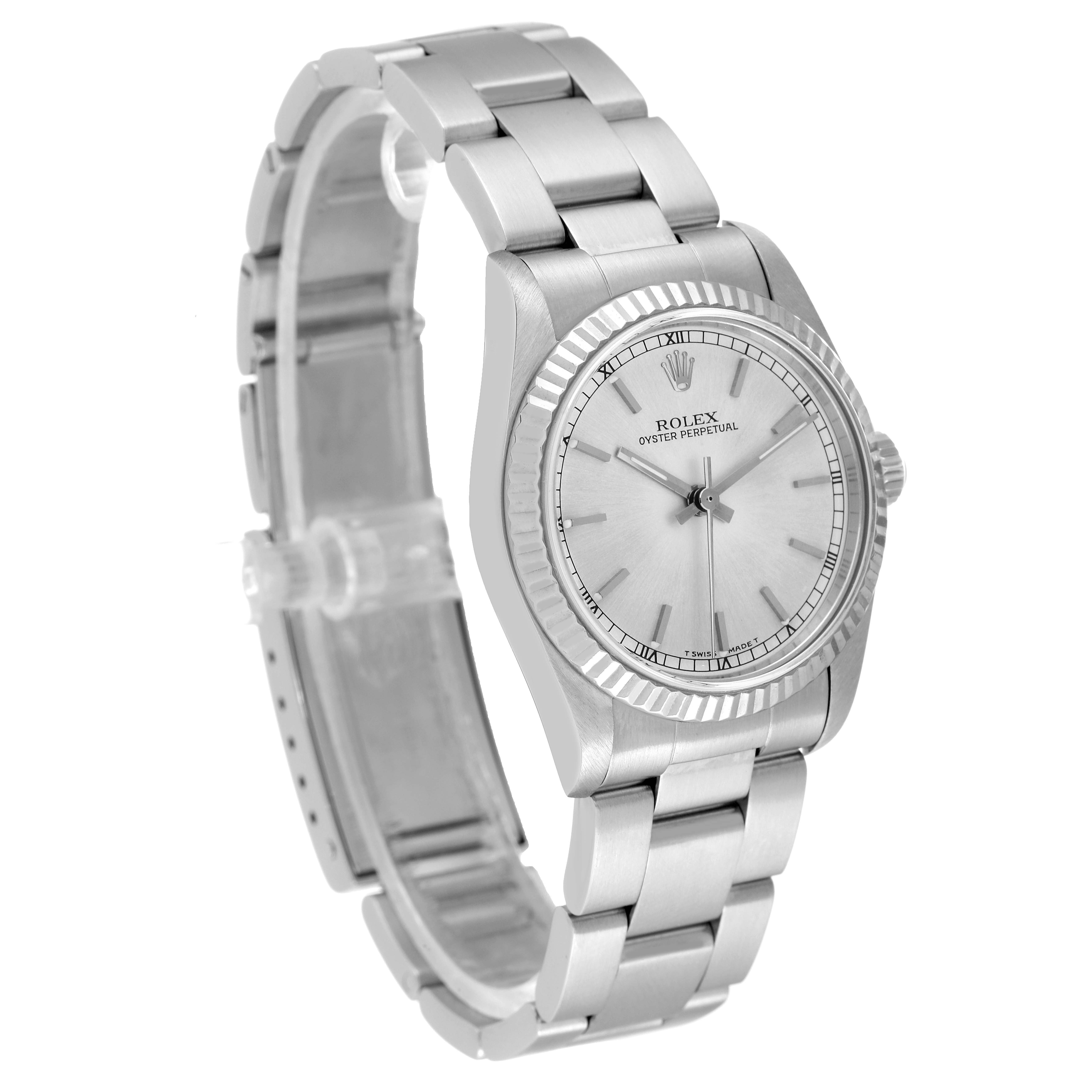 The image shows a Mid-Size Rolex Oyster Perpetual watch at an angled front view, highlighting its face, bezel, and bracelet.