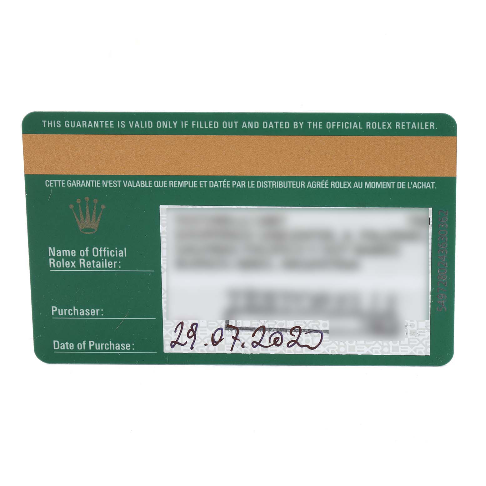 The image shows a close-up of a warranty card for a Mid-Size Rolex watch.