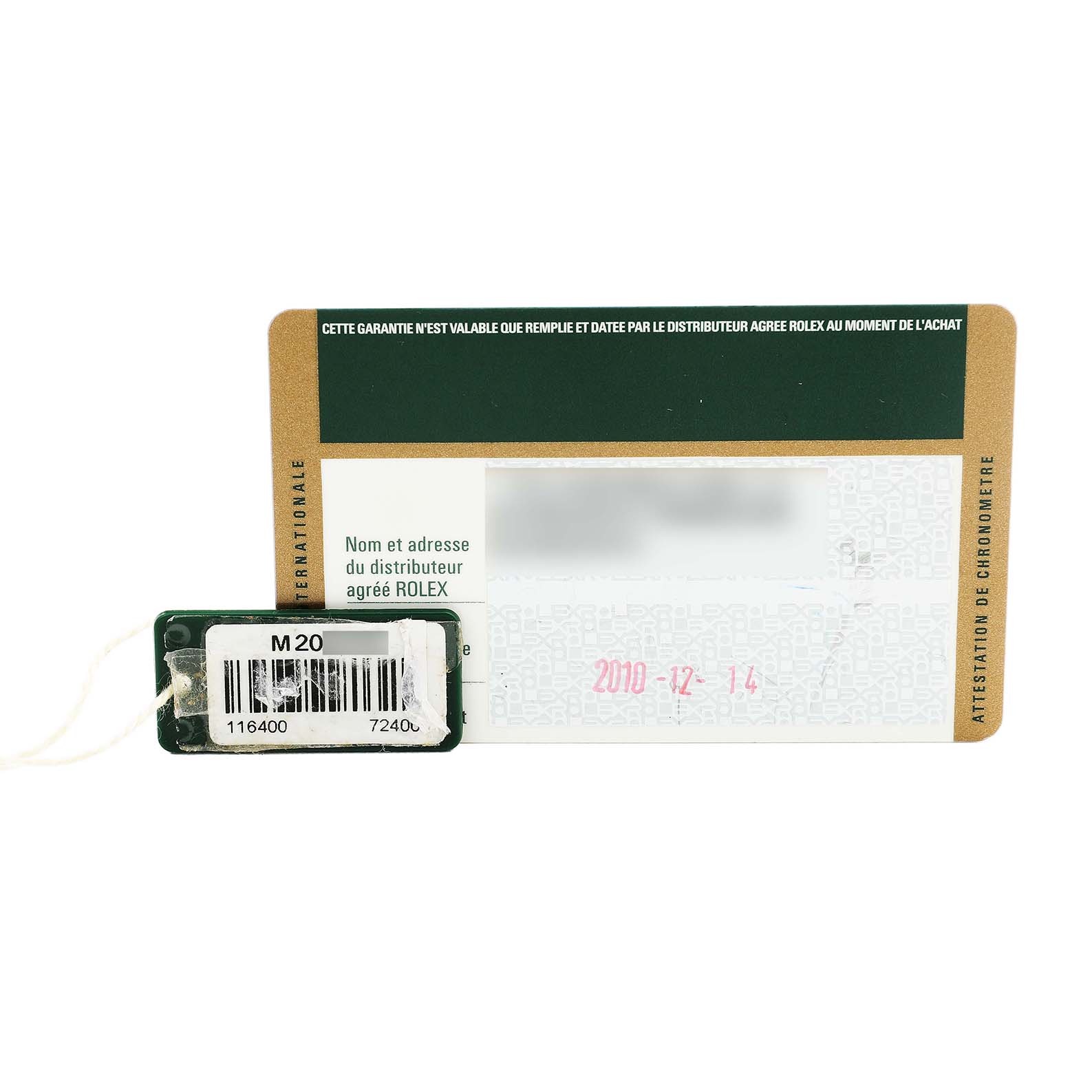 The image shows a warranty card and a tag for the Rolex Milgauss 116400 Men's Stainless Steel Black Dial model.