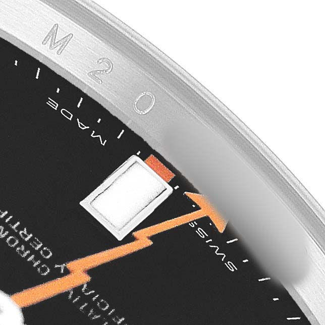The image shows a close-up of the dial edge and bezel of a Rolex Milgauss 116400 Men's Stainless Steel Black Dial, highlighting the hour marker and text details.