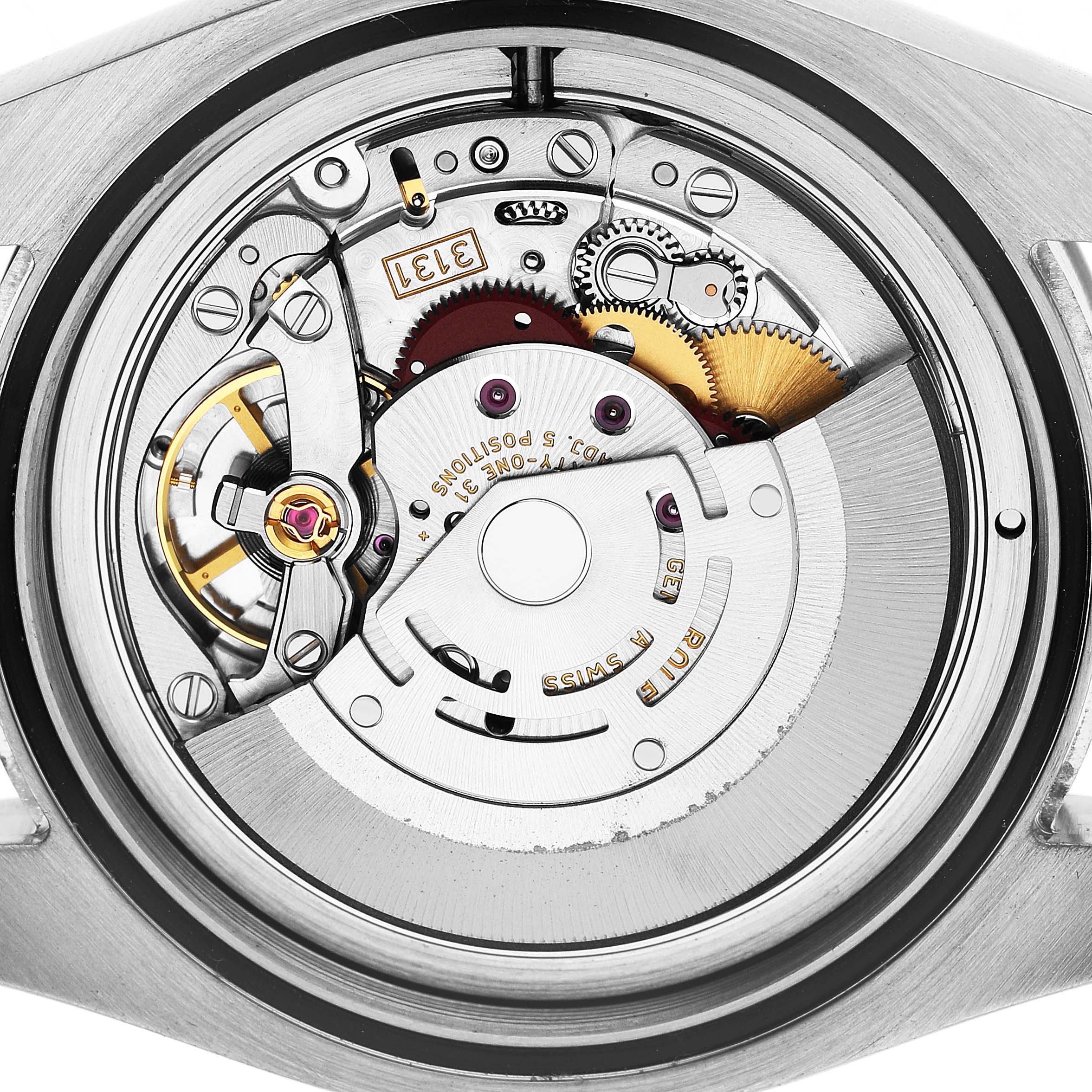 The image shows the movement of a Rolex Milgauss 116400GV Men's Stainless Steel Blue Dial watch from a back angle, highlighting the intricate gears and components.