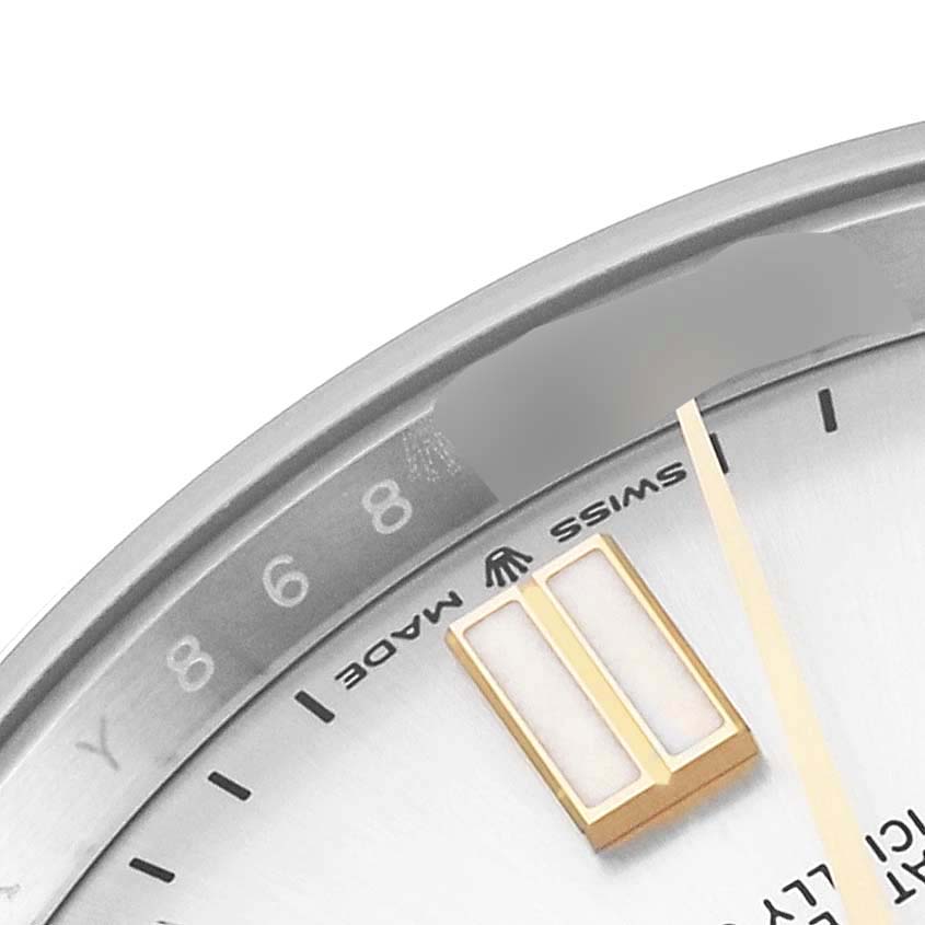 This close-up angle shows the dial, Swiss Made marking, and partial bezel of the Rolex Oyster Perpetual 124300 Men's Stainless Steel Silver Dial 124300 Men's Stainless Steel Silver Dial watch.