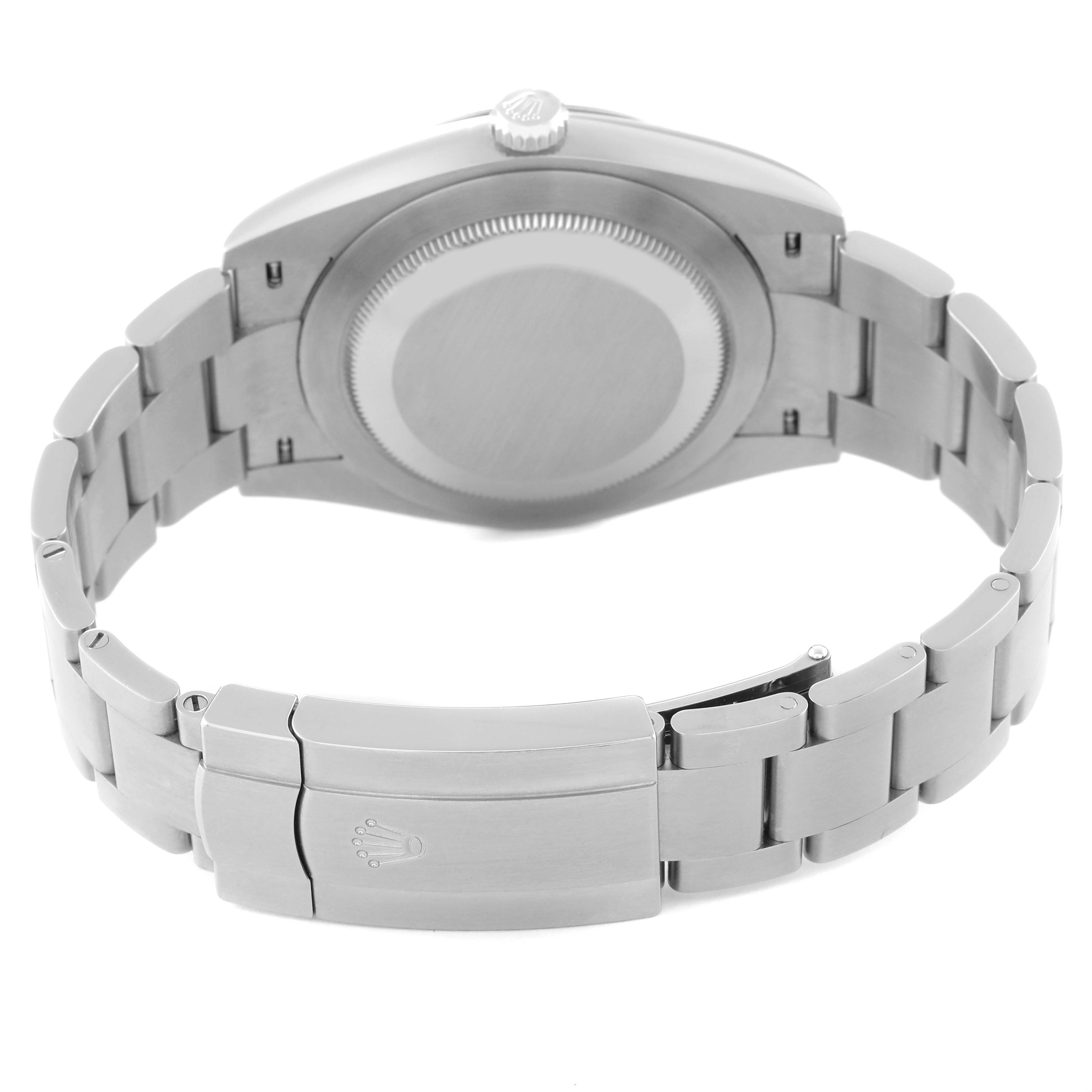 The image shows the back case and bracelet clasp of a Rolex Oyster Perpetual 124300 Men's Stainless Steel Blue Dial 124300 Men's Stainless Steel Blue Dial watch from a rear angle.